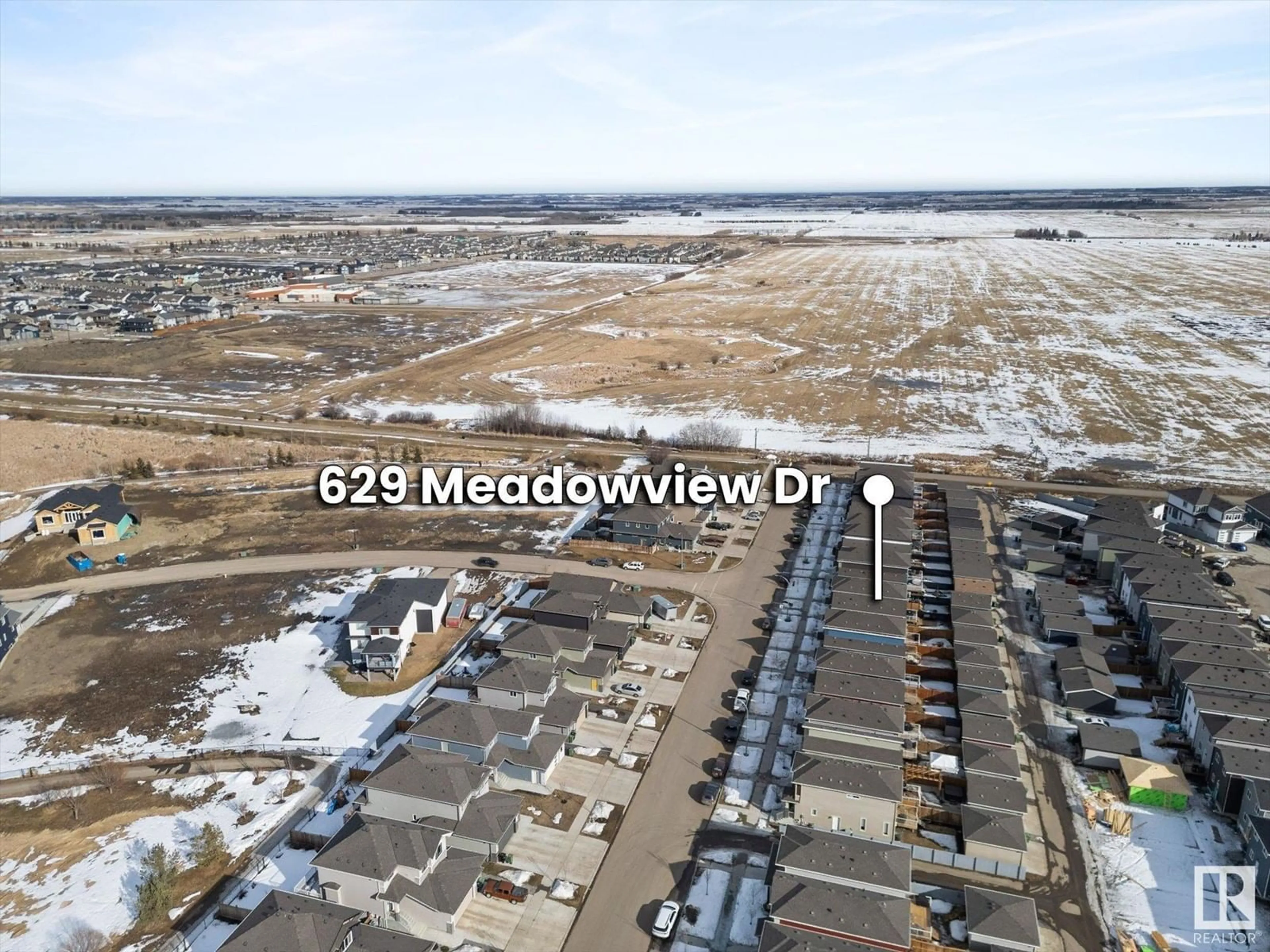 A pic from outside/outdoor area/front of a property/back of a property/a pic from drone, mountain view for 629 Meadowview Drive, Fort Saskatchewan Alberta T8L0X2