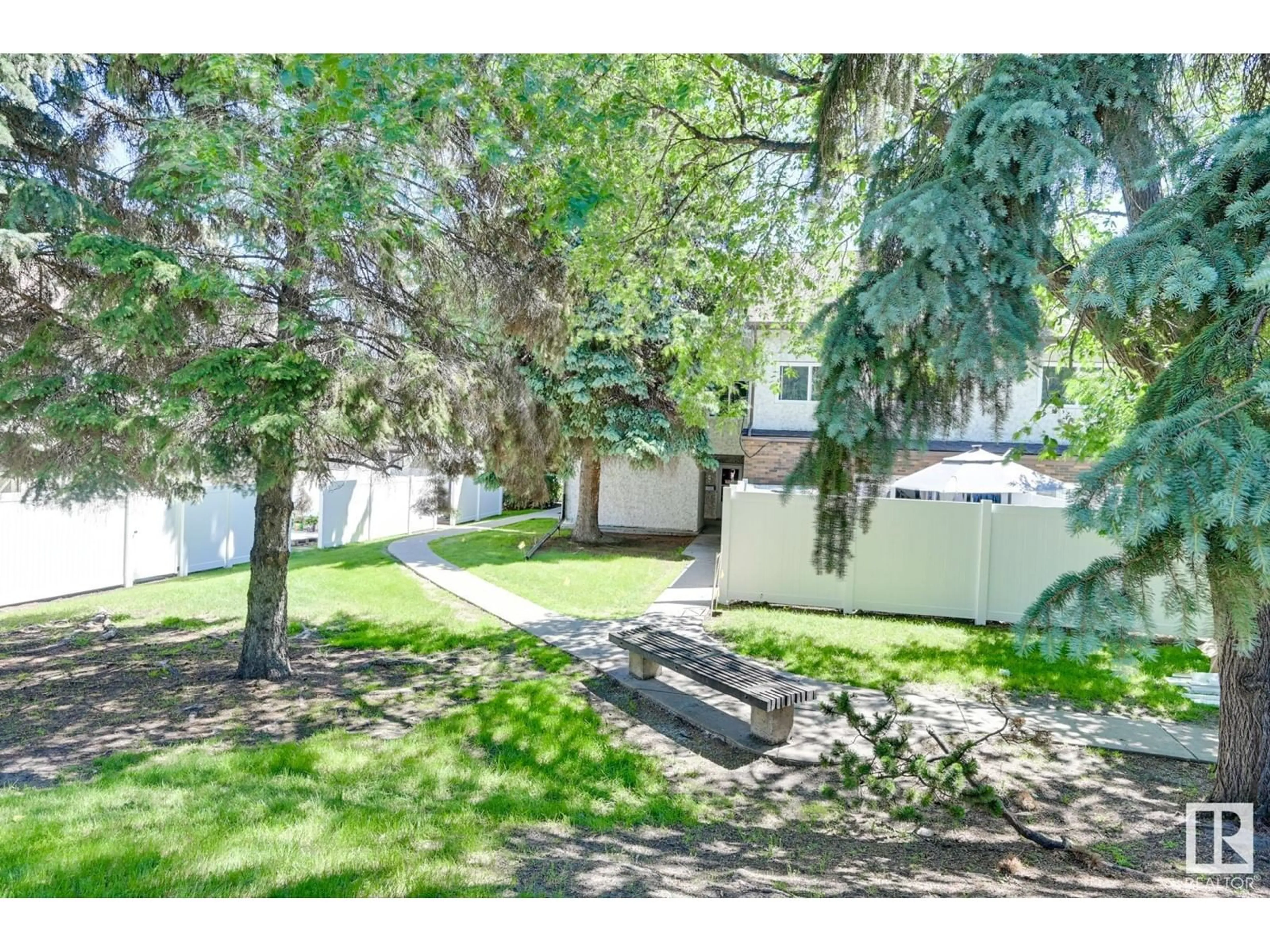 A pic from outside/outdoor area/front of a property/back of a property/a pic from drone, street for 20F MEADOWLARK VG NW, Edmonton Alberta T5R5X3