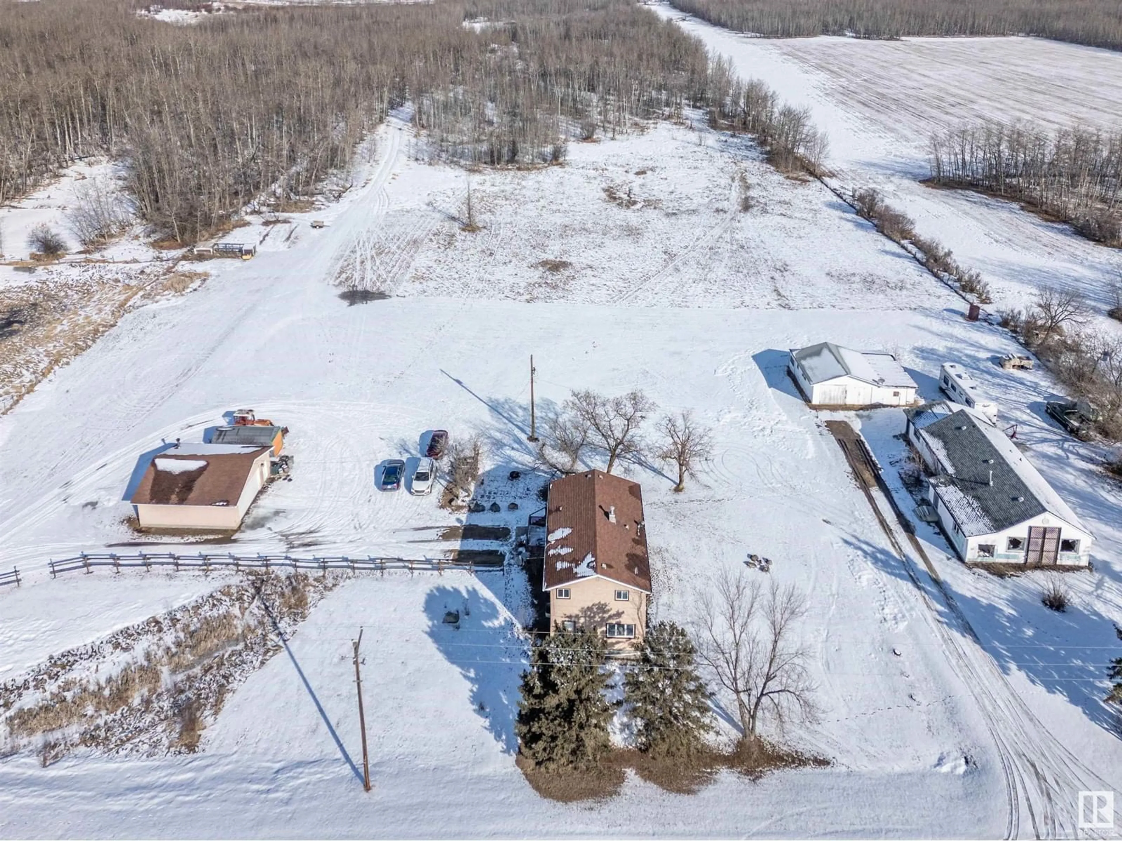 A pic from outside/outdoor area/front of a property/back of a property/a pic from drone, water/lake/river/ocean view for 21436 HWY 14, Rural Strathcona County Alberta T8E1G9