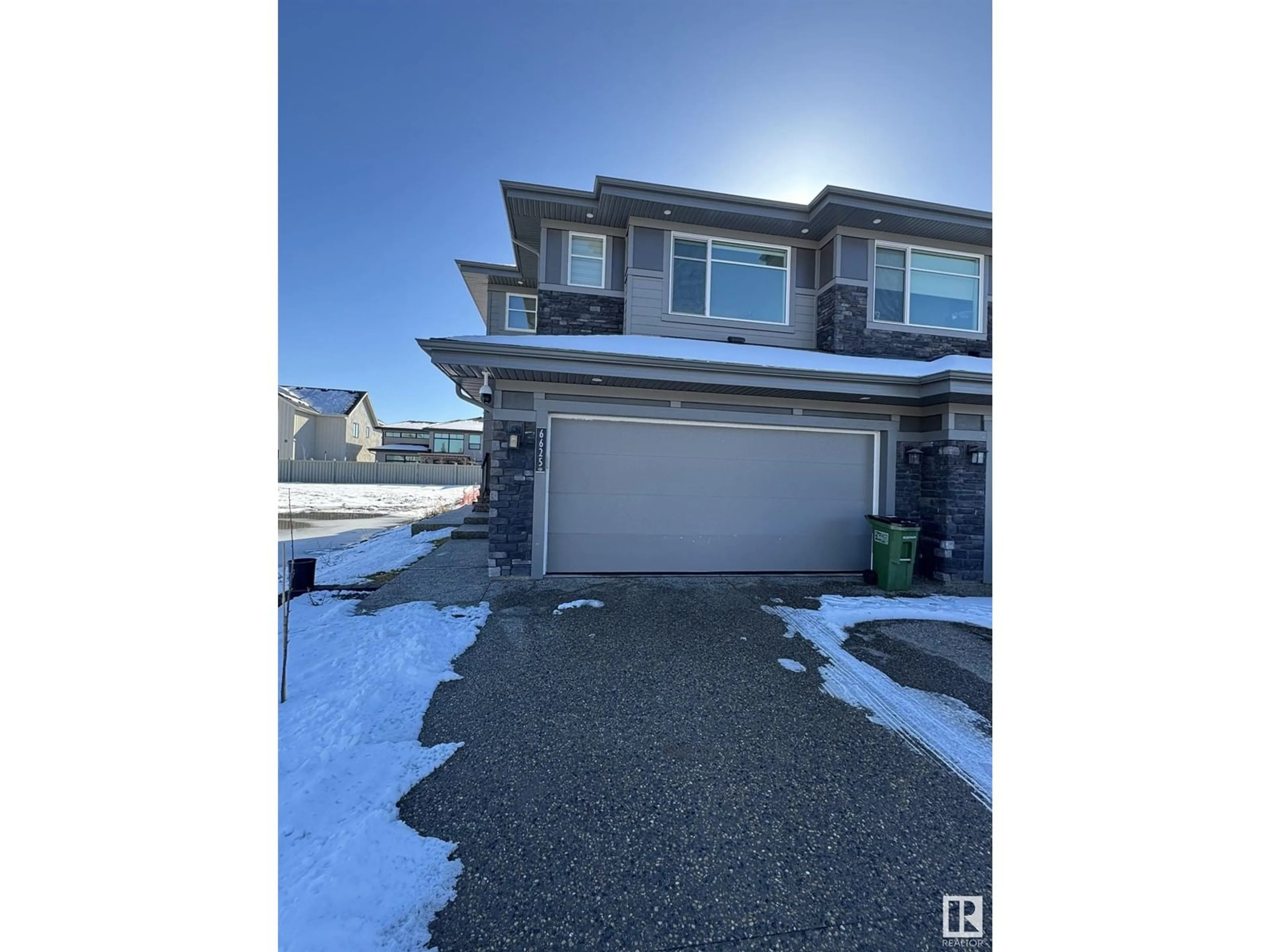 A pic from outside/outdoor area/front of a property/back of a property/a pic from drone, street for 6625 CRAWFORD LD SW, Edmonton Alberta T6W4L5