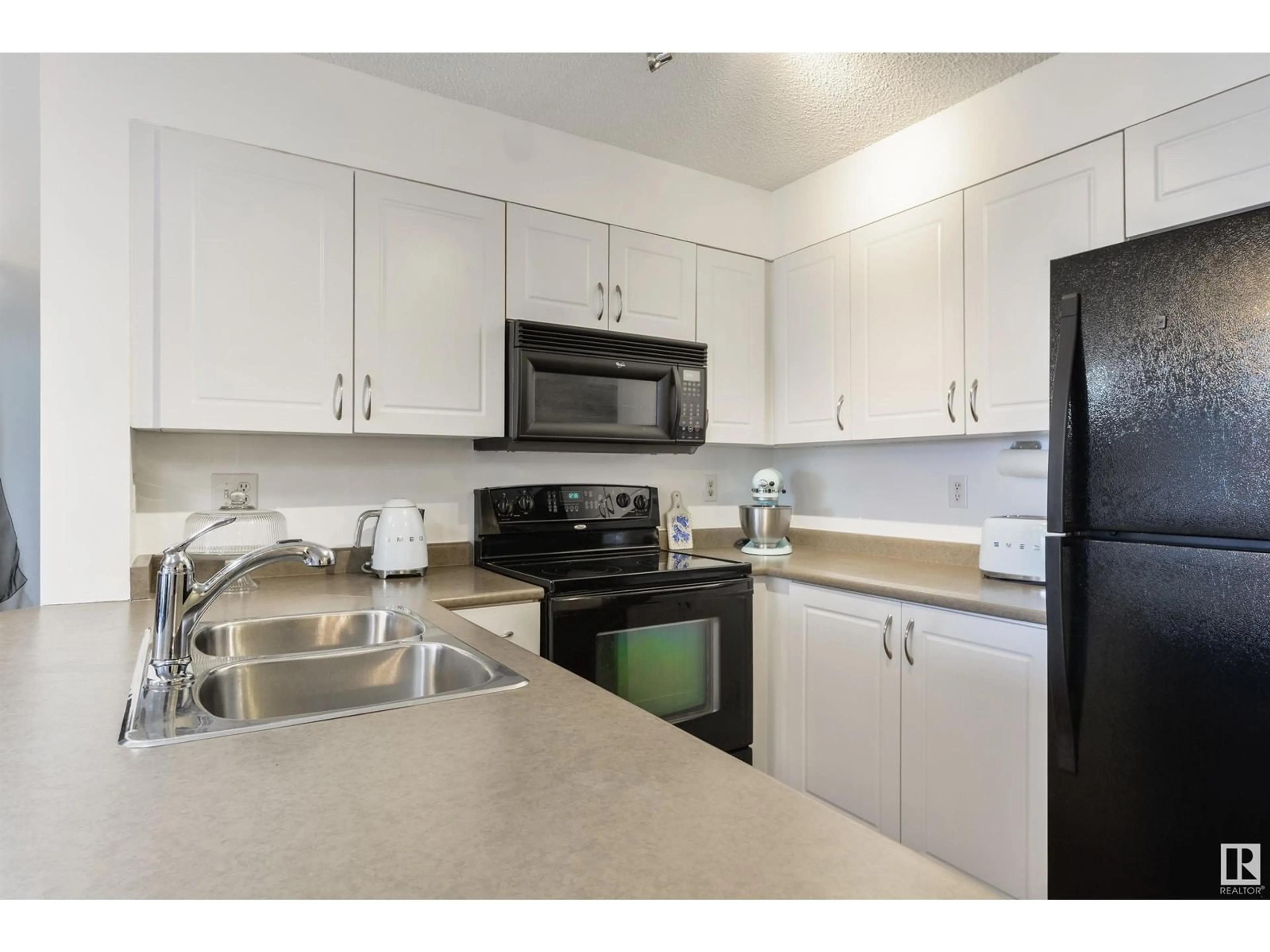 Standard kitchen, unknown for #414 11449 ELLERSLIE RD SW, Edmonton Alberta T6W1T2