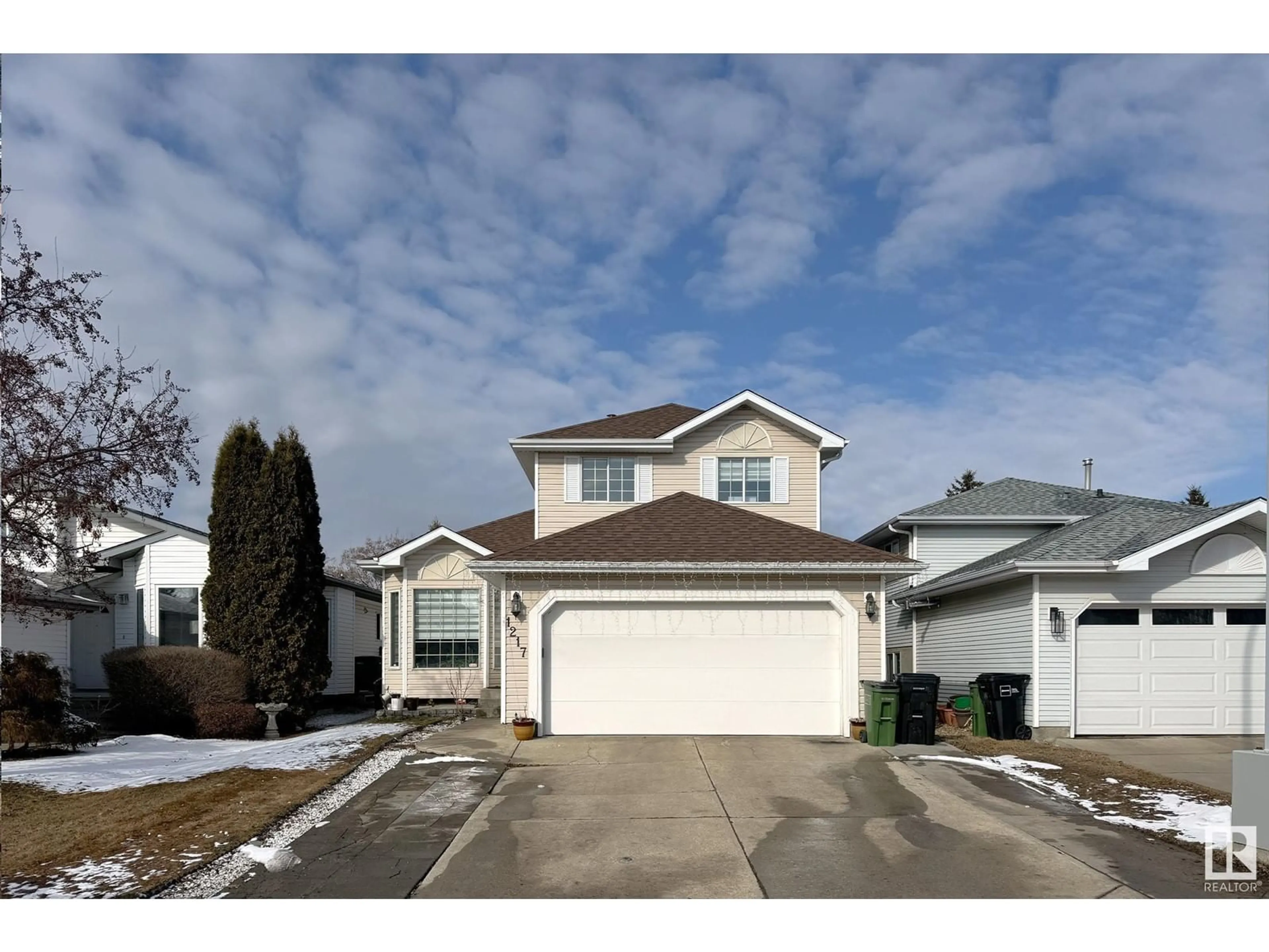 Home with vinyl exterior material, street for 1217 KANE WD NW NW, Edmonton Alberta T6L6T7