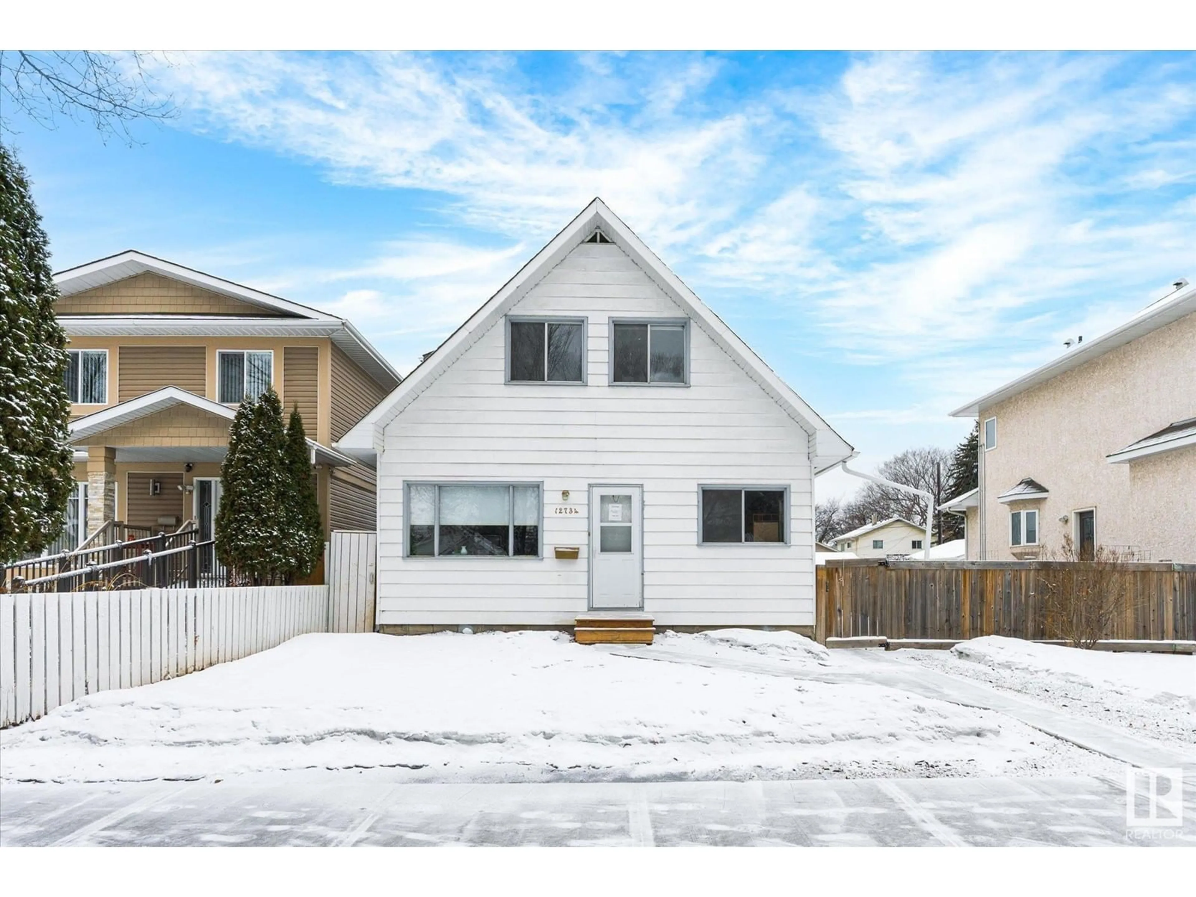 Home with vinyl exterior material, street for 12734 117 ST NW, Edmonton Alberta T5E5J5