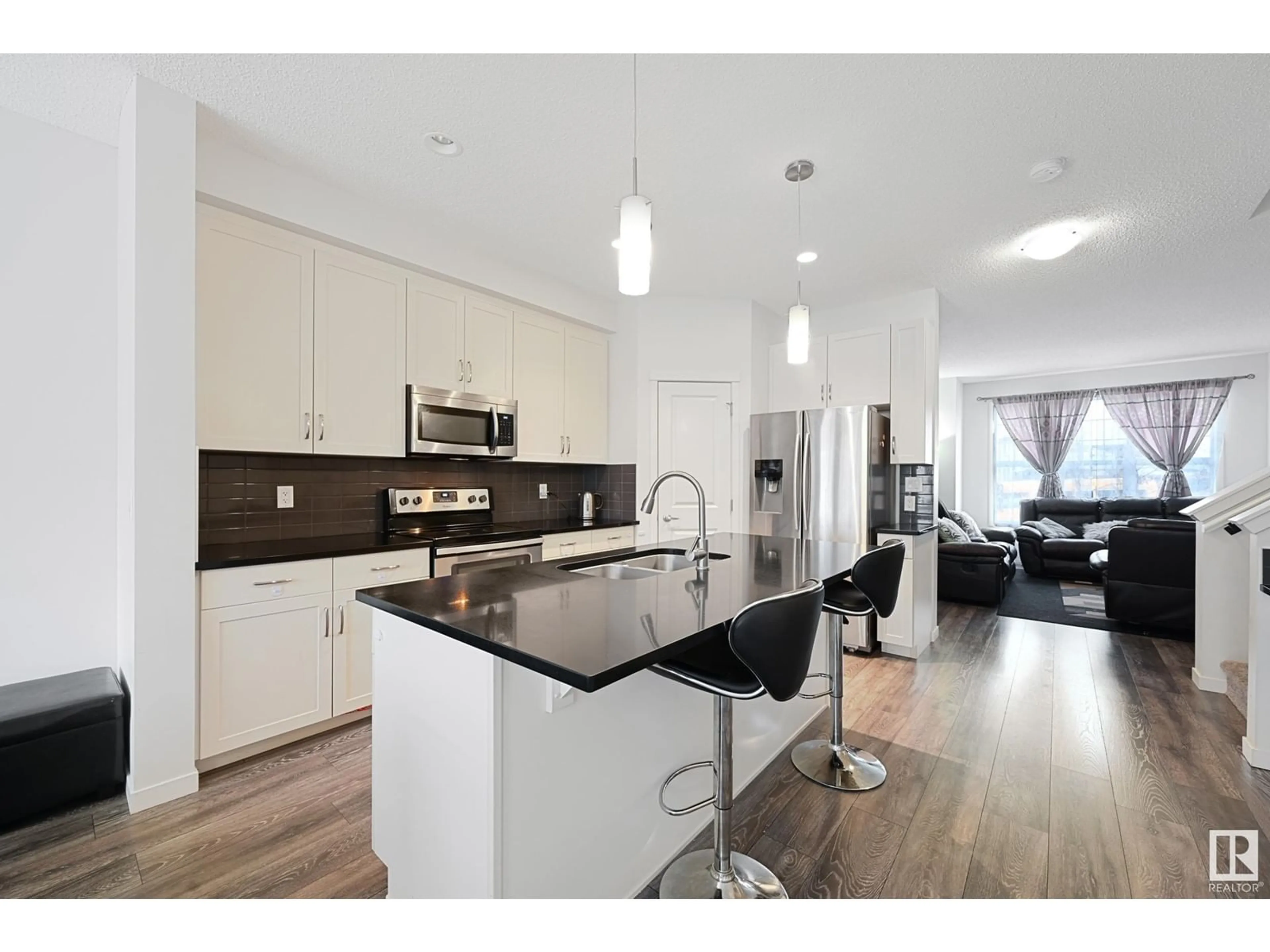 Open concept kitchen, unknown for 6351 170 AV NW, Edmonton Alberta T5Y3X7