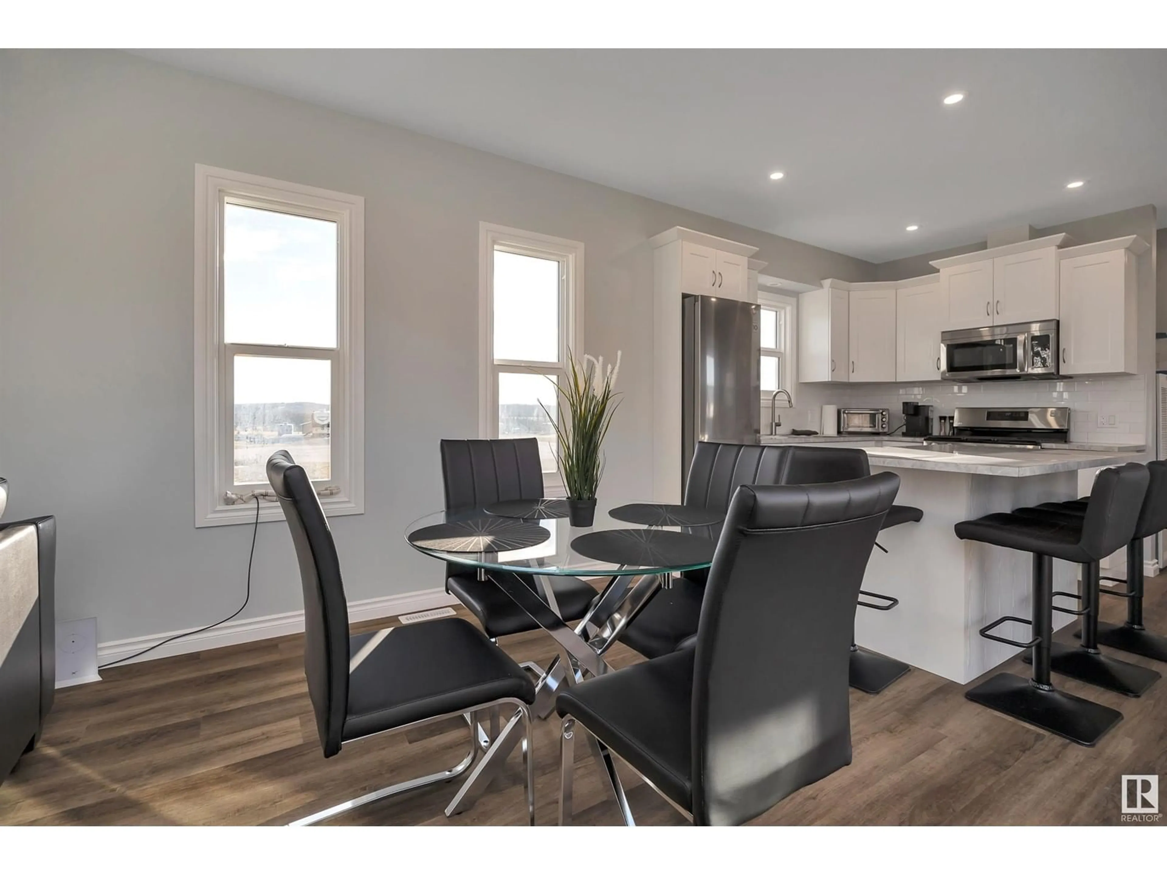 Open concept kitchen, wood/laminate floor for 505 454029 RGE RD 11, Rural Wetaskiwin County Alberta T0C2V0