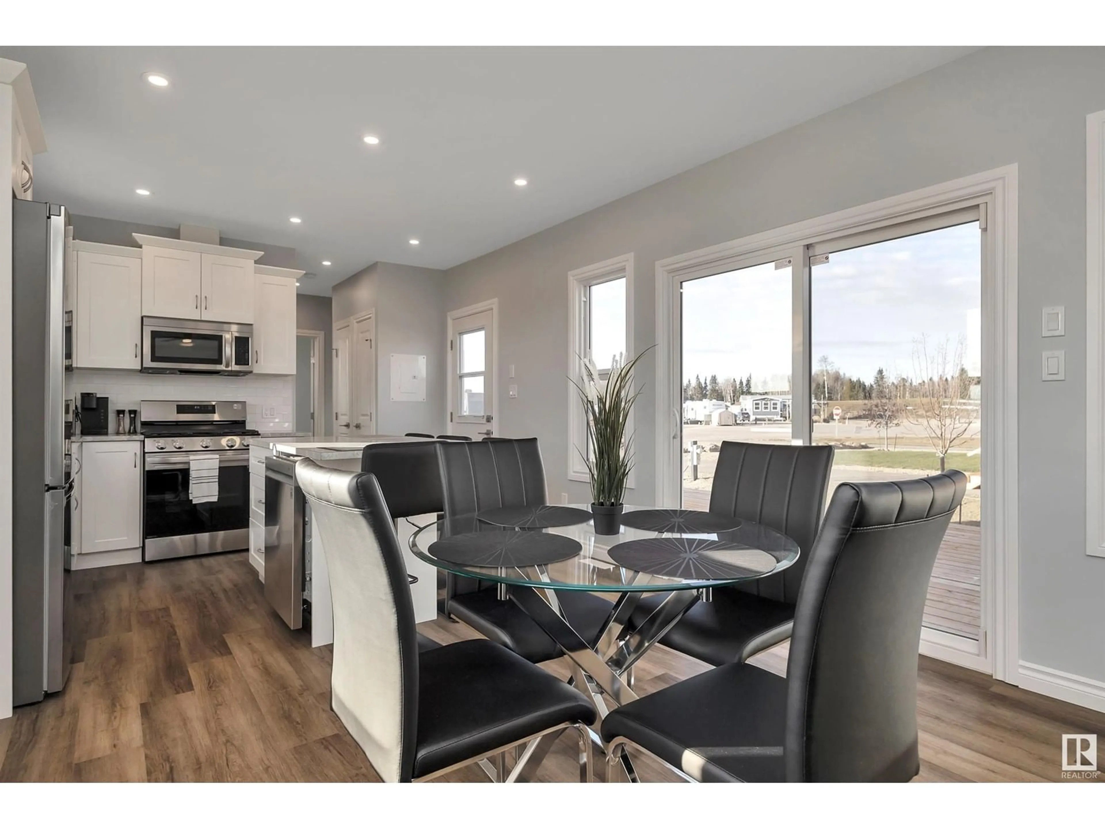Open concept kitchen, wood/laminate floor for 505 454029 RGE RD 11, Rural Wetaskiwin County Alberta T0C2V0
