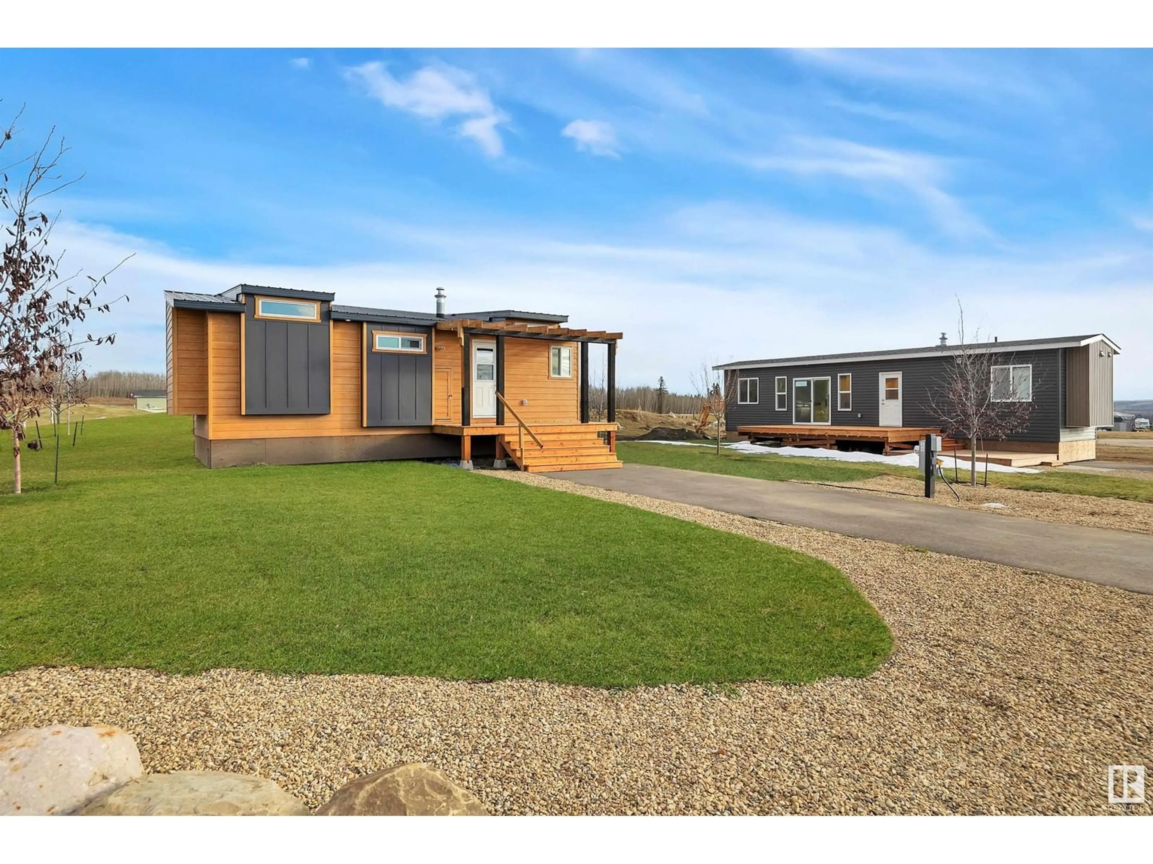 A pic from outside/outdoor area/front of a property/back of a property/a pic from drone, building for 501 454029 RGE RD 11, Rural Wetaskiwin County Alberta T0C2V0