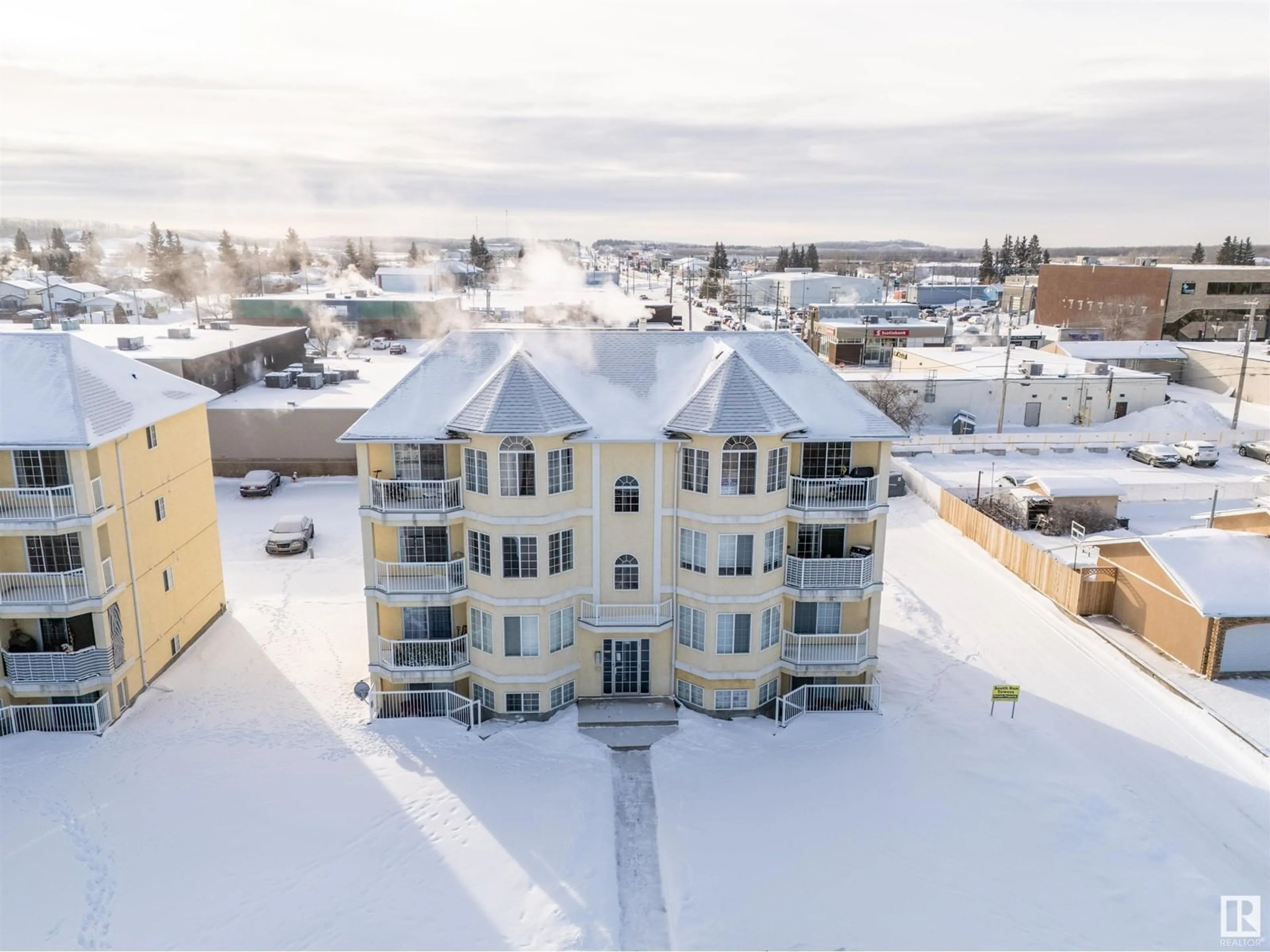 A pic from outside/outdoor area/front of a property/back of a property/a pic from drone, water/lake/river/ocean view for #8 - 4917 51 AV, Cold Lake Alberta T9M2B8