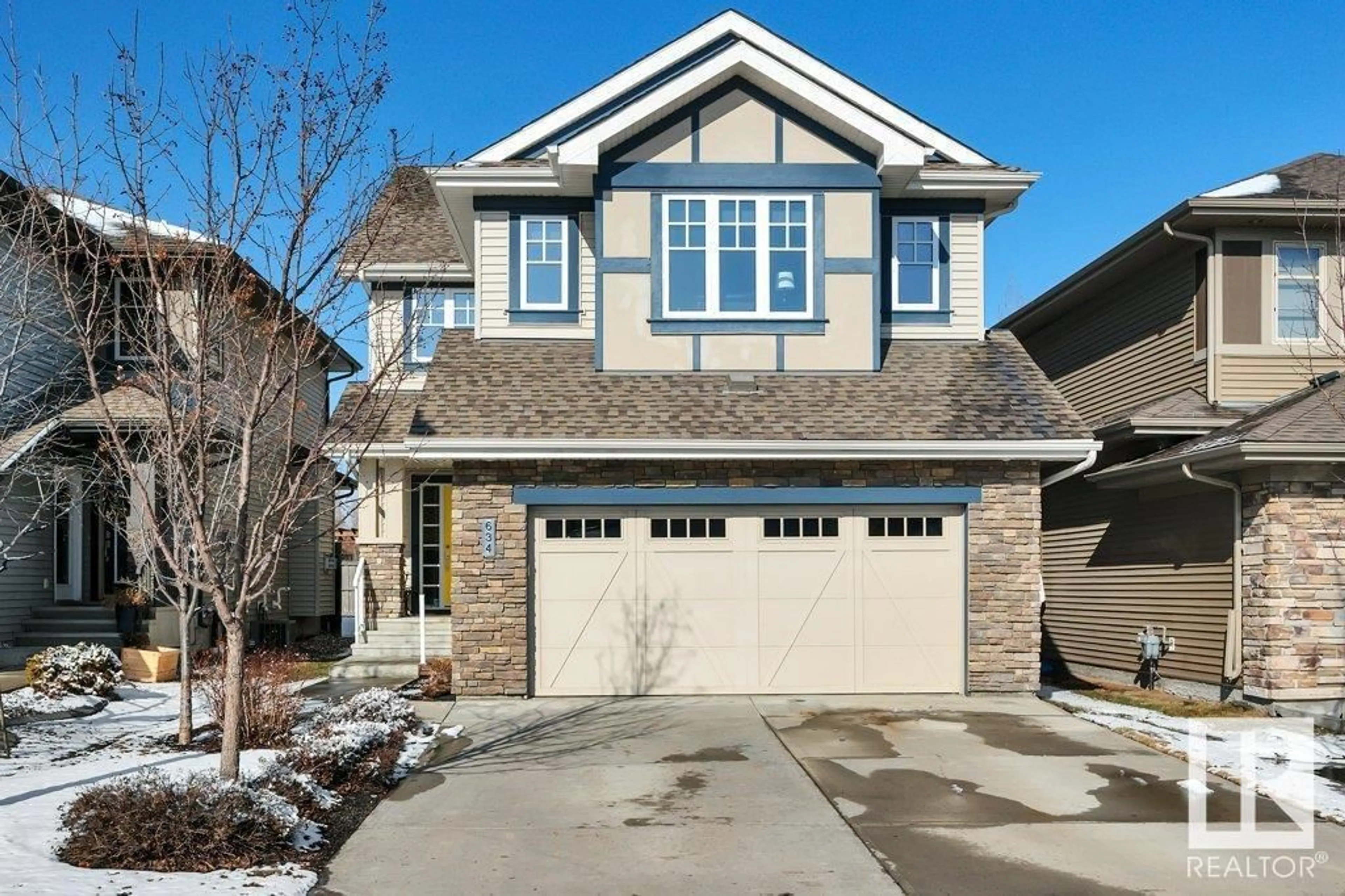 Home with vinyl exterior material, street for 634 ADAMS WY SW, Edmonton Alberta T6W0J9