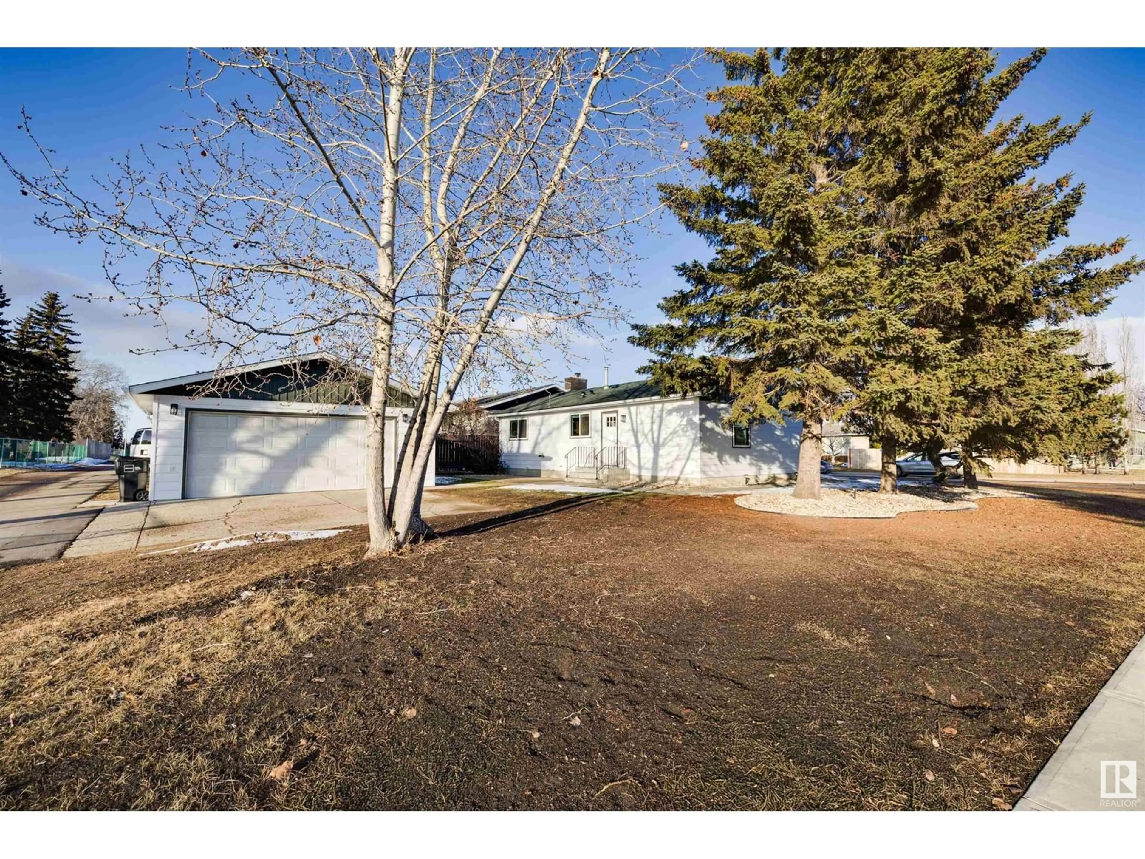 A pic from outside/outdoor area/front of a property/back of a property/a pic from drone, street for 12716 48 ST NW, Edmonton Alberta T5A2R8