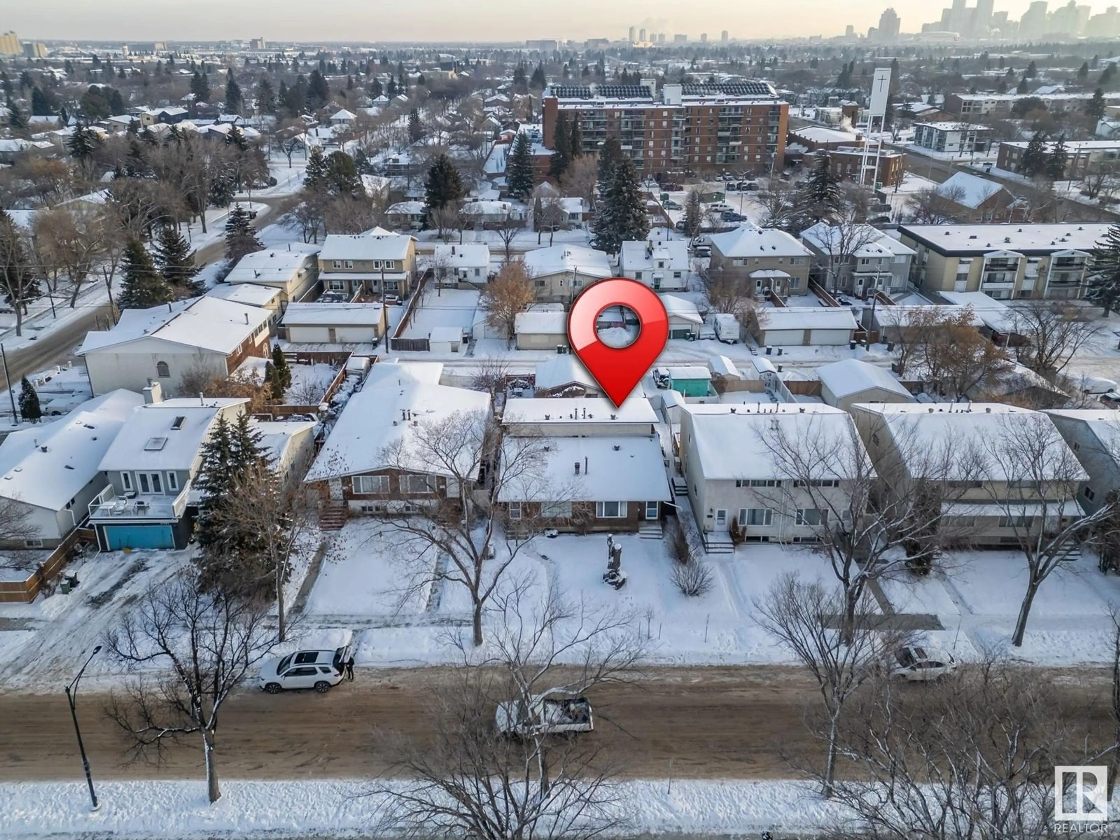 A pic from outside/outdoor area/front of a property/back of a property/a pic from drone, street for 11131 130 ST NW, Edmonton Alberta T5M0Z9