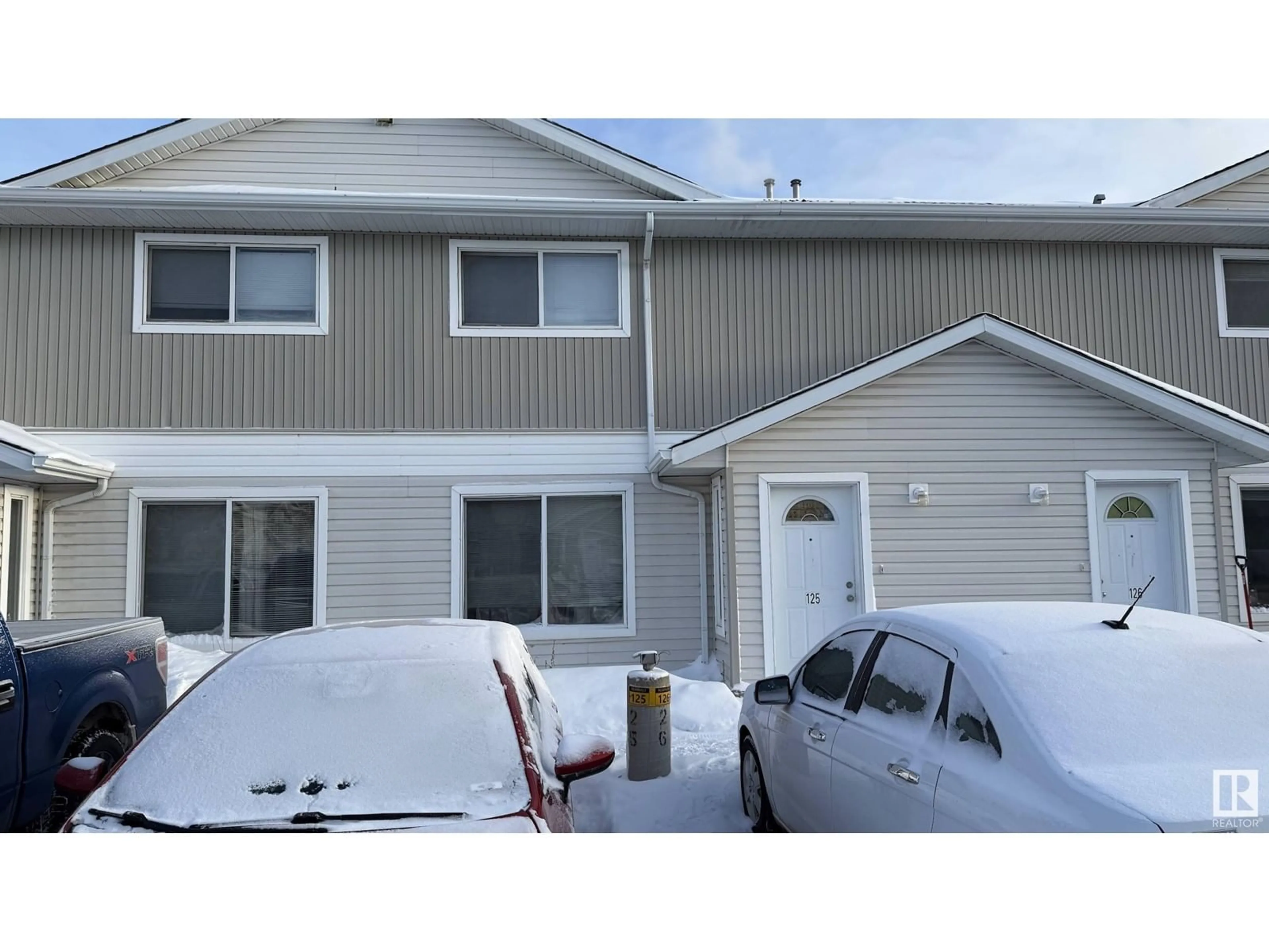 Home with vinyl exterior material, street for #125 180 BRIDGEPORT BV, Leduc Alberta T9E8S1