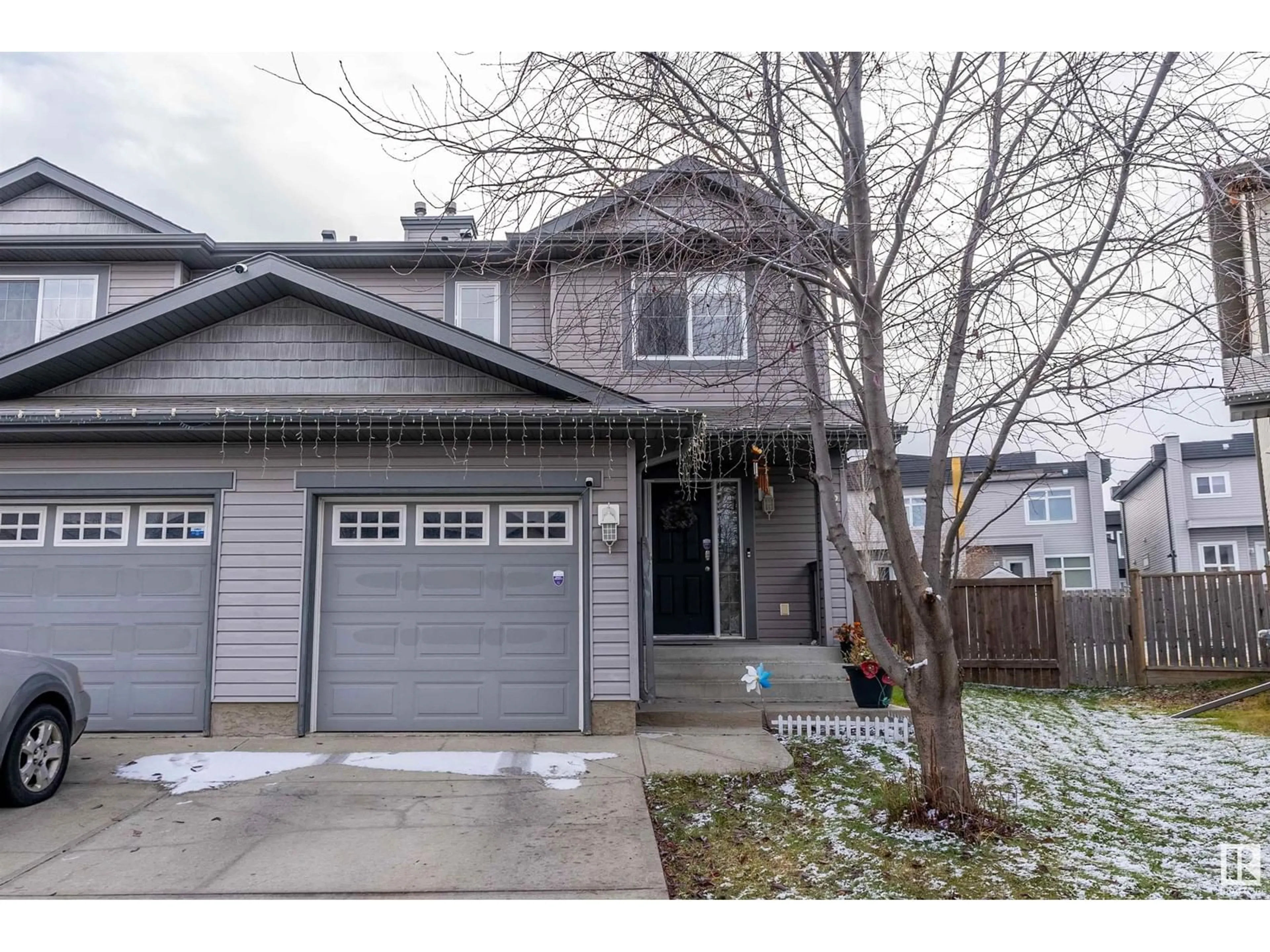 Home with vinyl exterior material, street for 2031 Hammond Cl NW, Edmonton Alberta T6M0K2