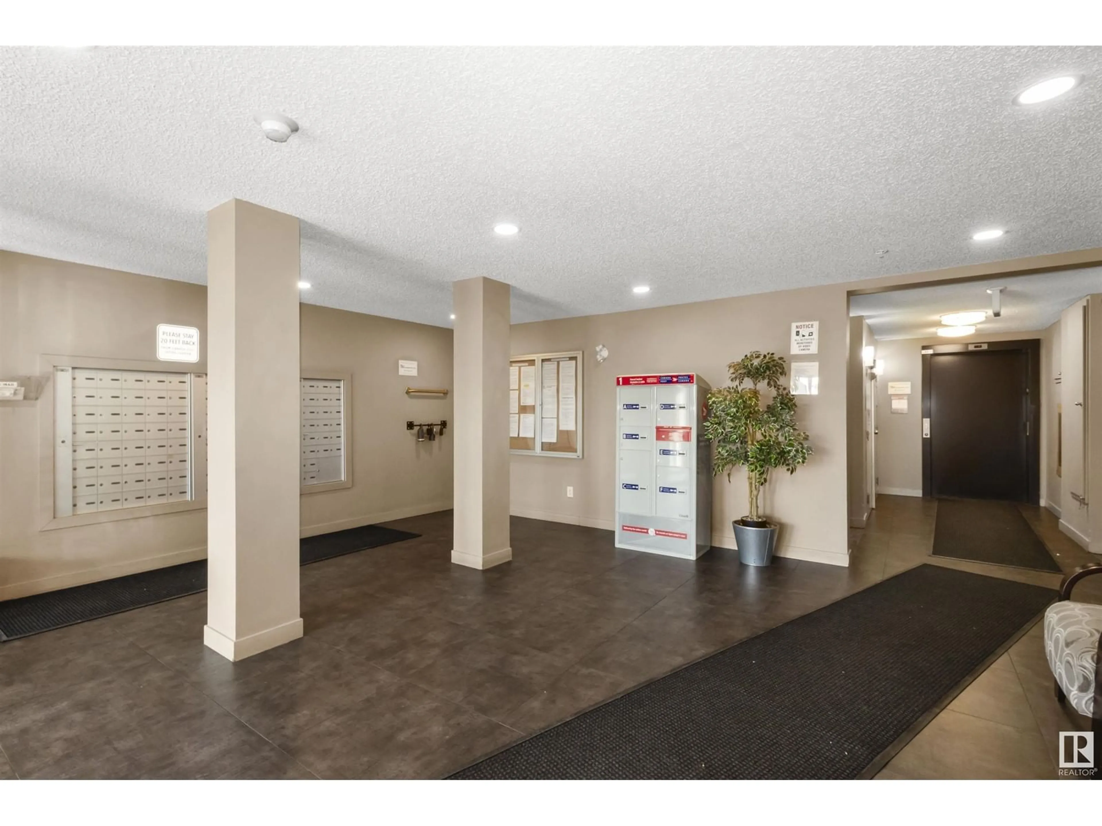 Indoor foyer for #320 274 MCCONACHIE DR NW, Edmonton Alberta T5Y3N4