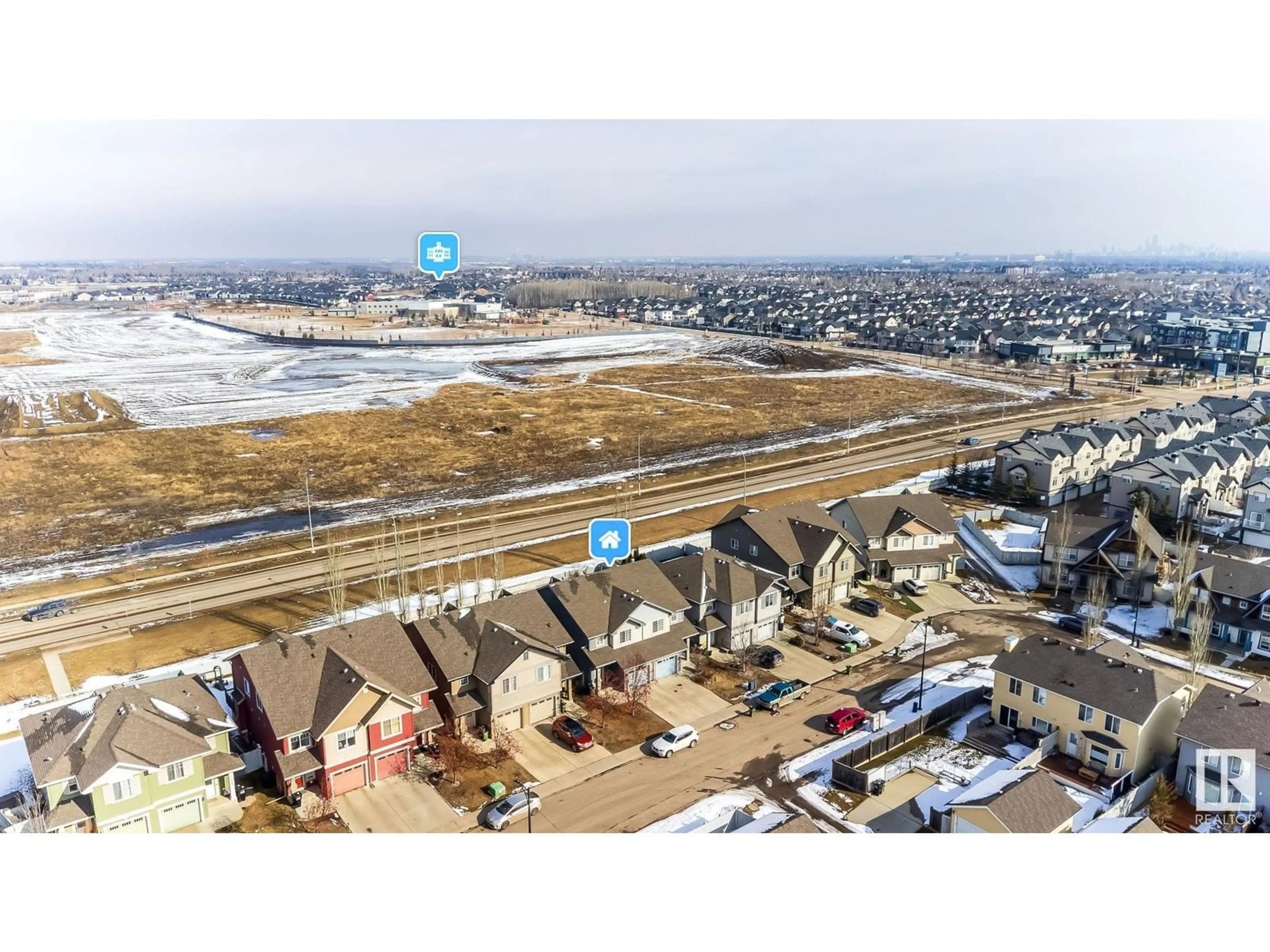 A pic from outside/outdoor area/front of a property/back of a property/a pic from drone, street for 21318 61 AV NW, Edmonton Alberta T6M0J9