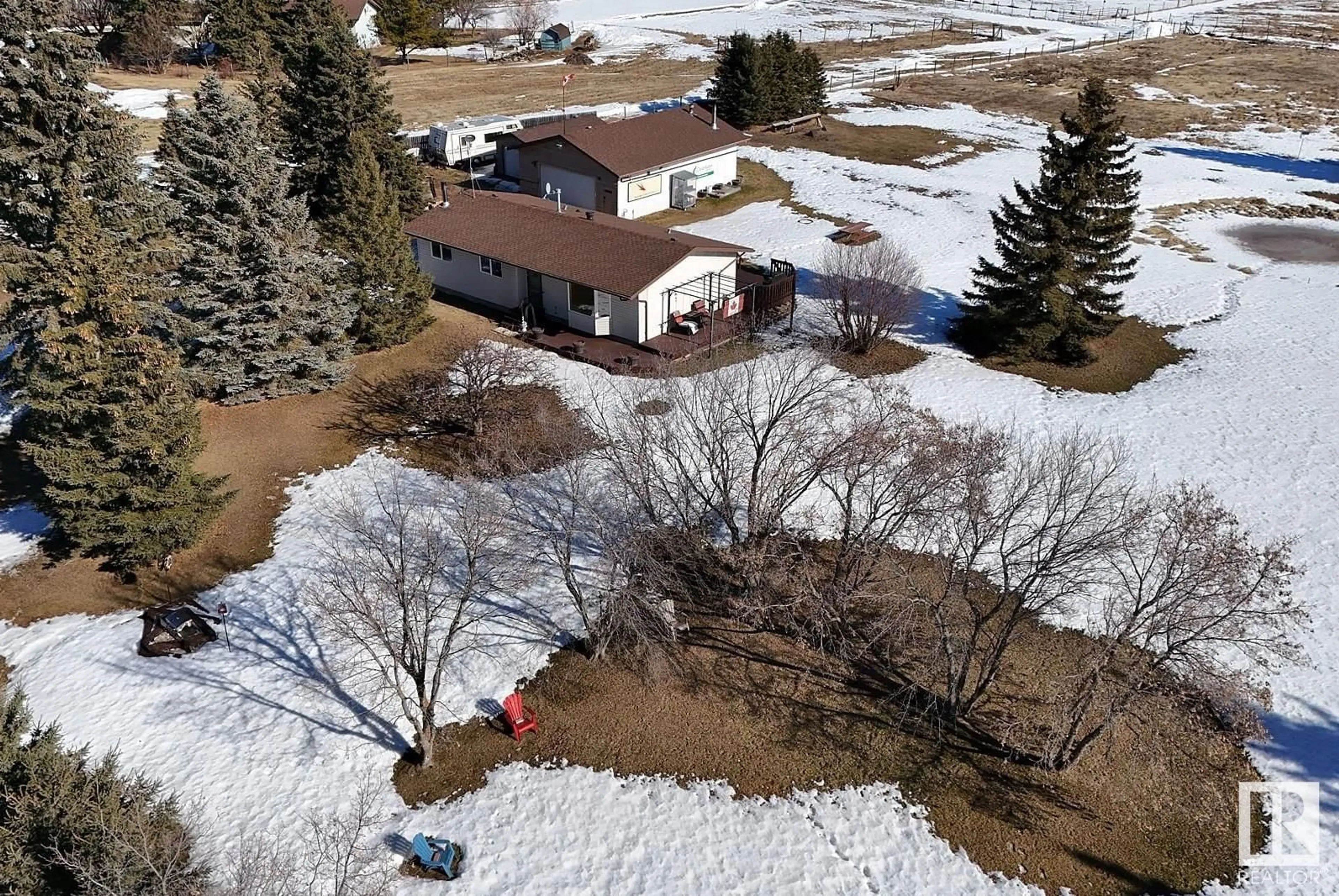 A pic from outside/outdoor area/front of a property/back of a property/a pic from drone, unknown for #278 52307 RGE ROAD 213, Rural Strathcona County Alberta T8G1C1