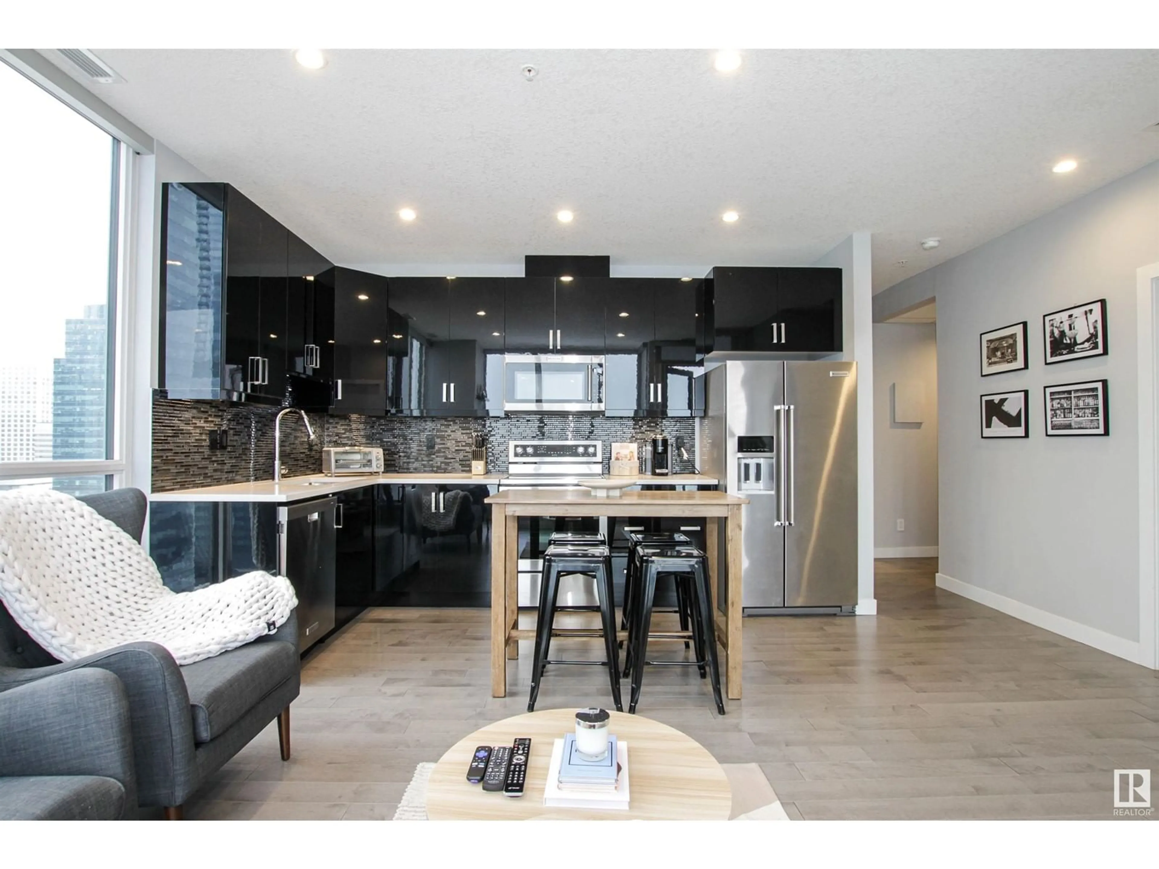 Open concept kitchen, wood/laminate floor for #2003 10238 103 ST NW, Edmonton Alberta T5J0G6