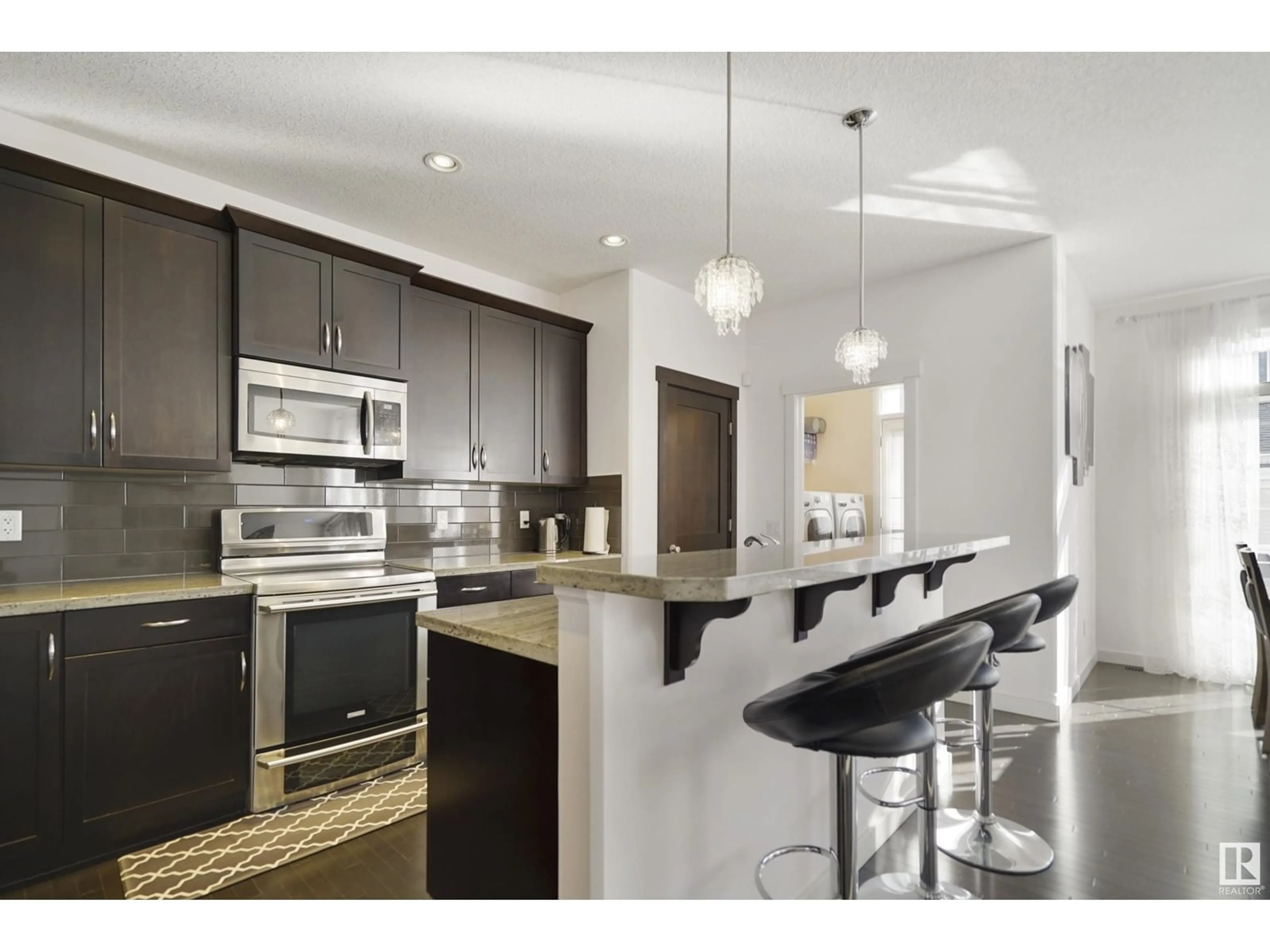 Open concept kitchen, unknown for 2213 STAN WATERS AV NW, Edmonton Alberta T5E6B9