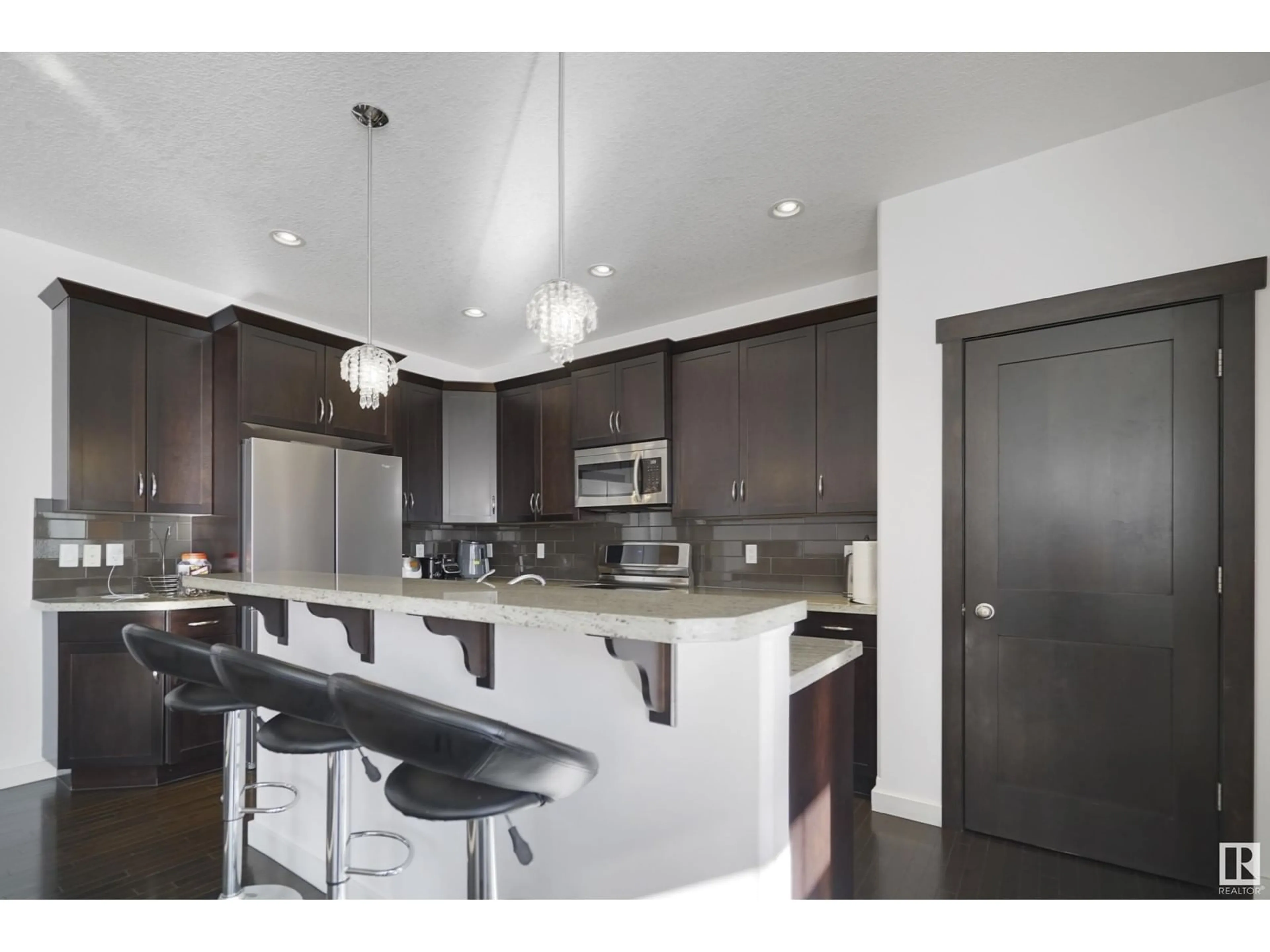 Open concept kitchen, unknown for 2213 STAN WATERS AV NW, Edmonton Alberta T5E6B9