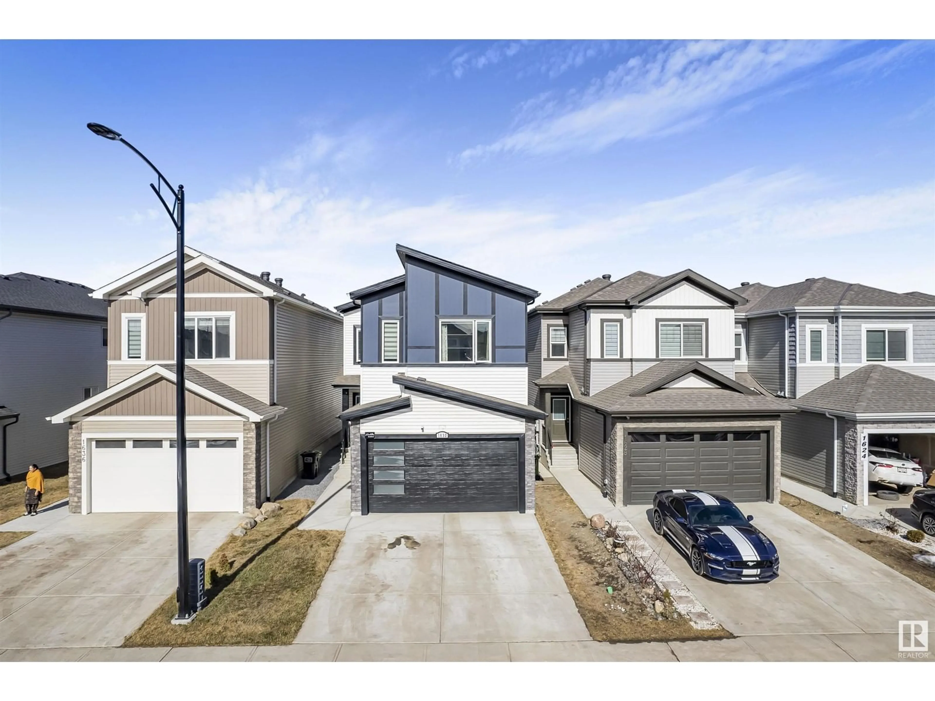 A pic from outside/outdoor area/front of a property/back of a property/a pic from drone, street for 1632 14 AV NW NW, Edmonton Alberta T6T2S4