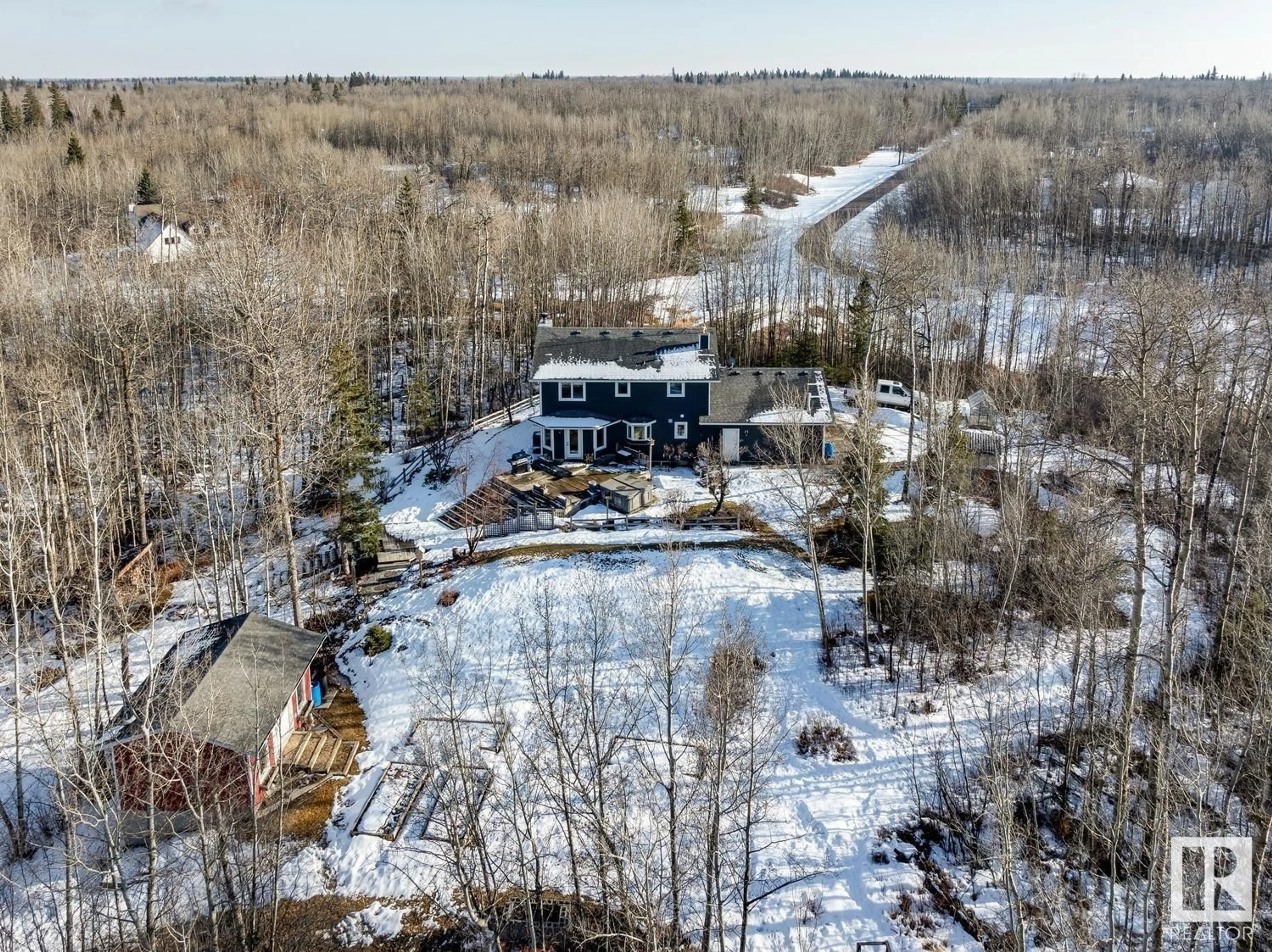 A pic from outside/outdoor area/front of a property/back of a property/a pic from drone, unknown for #181 51049 RGE ROAD 214, Rural Strathcona County Alberta T8E1G7