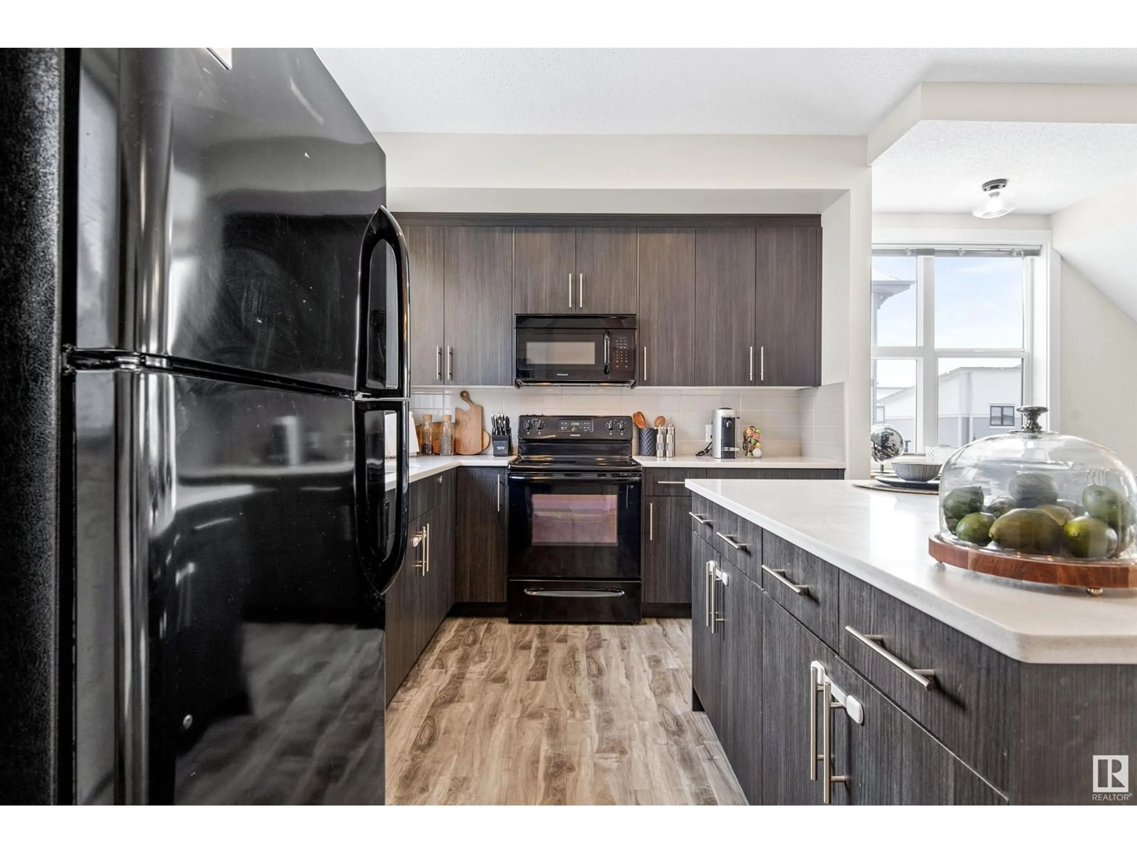 Open concept kitchen, unknown for #93 655 WATT BV SW, Edmonton Alberta T6X0Y2