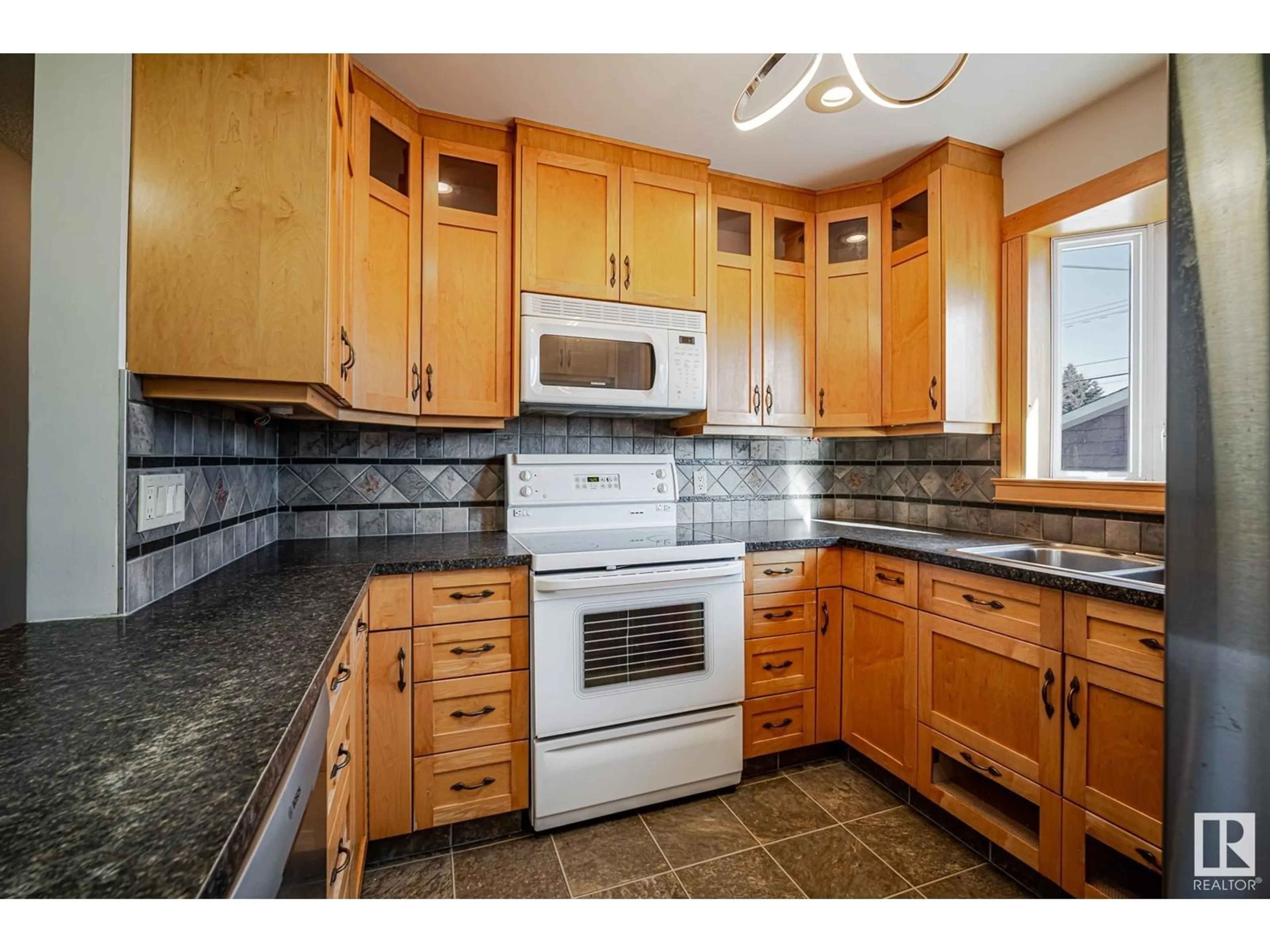 Standard kitchen, ceramic/tile floor for 13043 SHERBROOKE AV NW, Edmonton Alberta T5L4E6