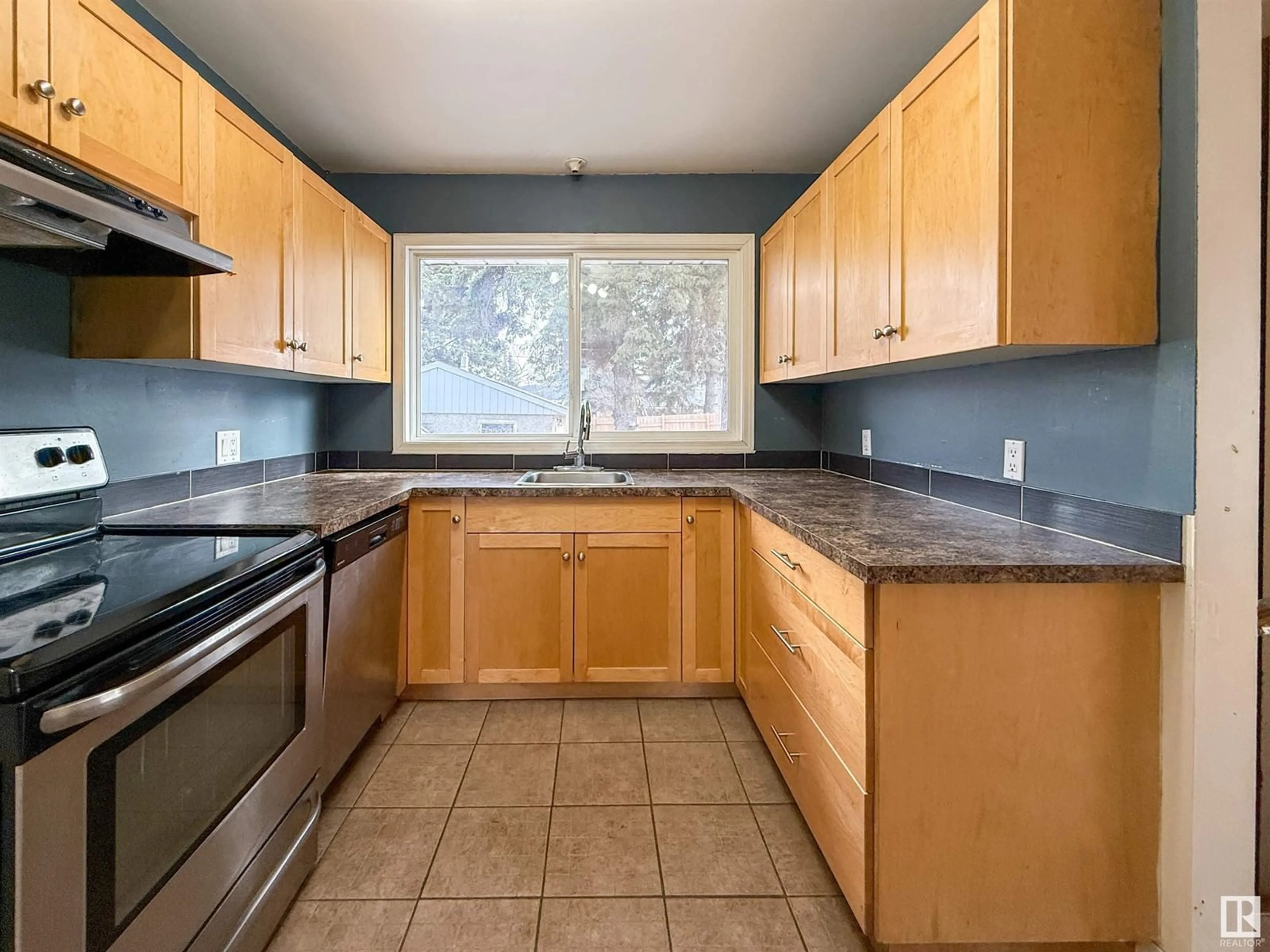 Standard kitchen, ceramic/tile floor for 11323 131 ST NW, Edmonton Alberta T5M1C5