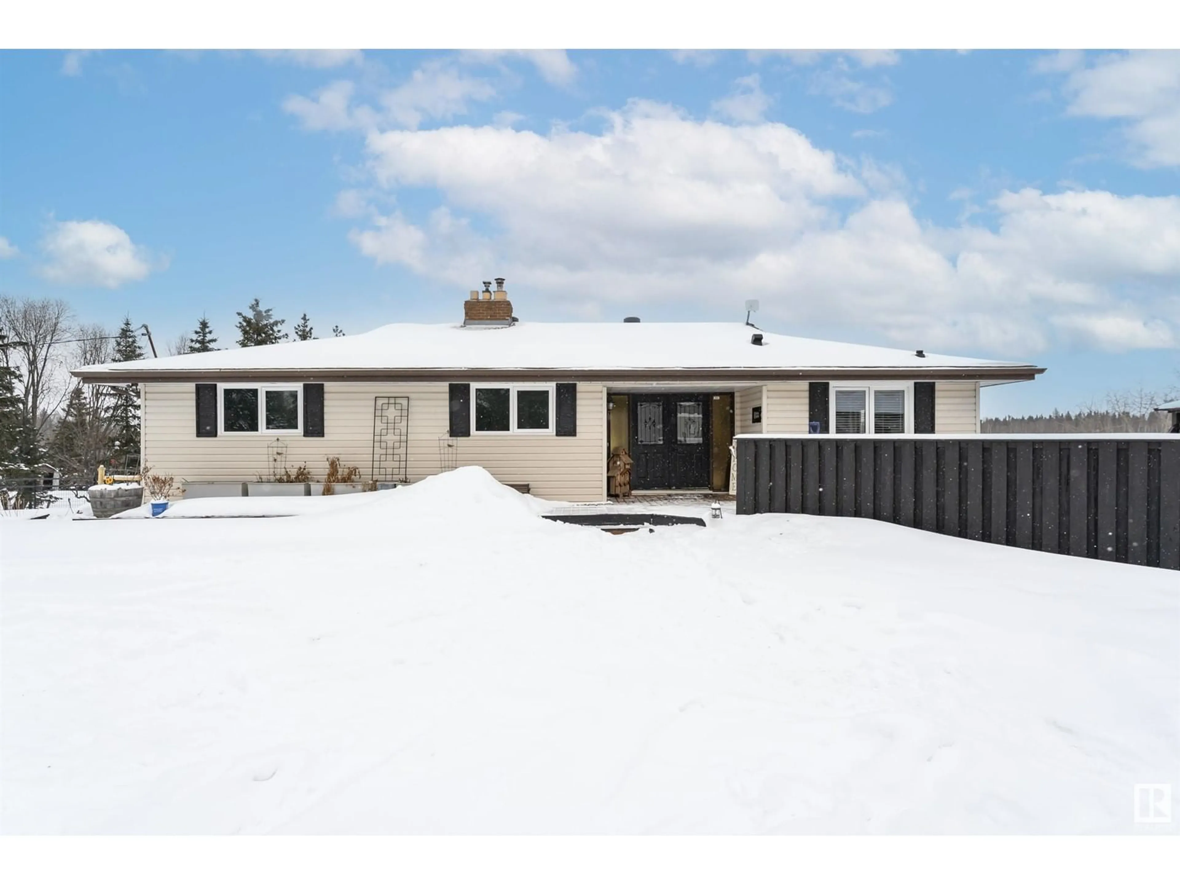 Home with vinyl exterior material, street for 133 52470 RR221, Rural Strathcona County Alberta T8H2H8