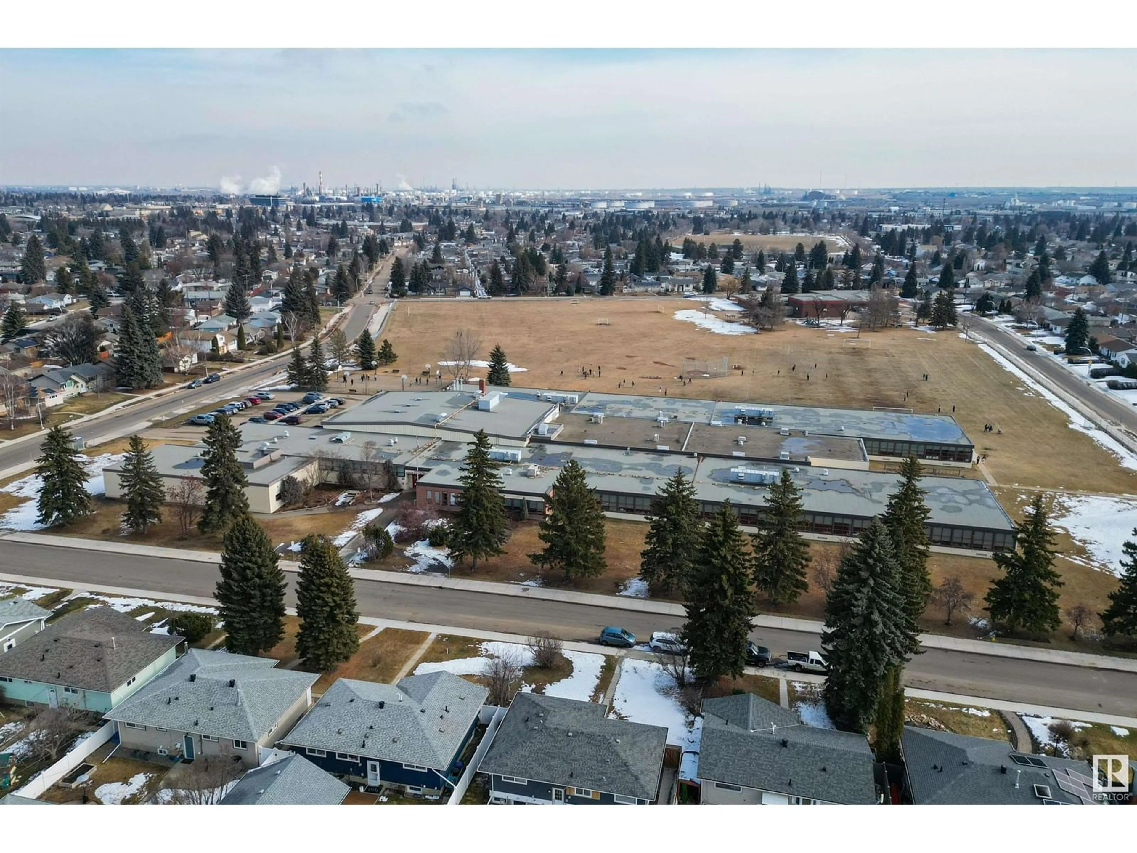 A pic from outside/outdoor area/front of a property/back of a property/a pic from drone, mountain view for 9431 74 ST, Edmonton Alberta T6B2B5