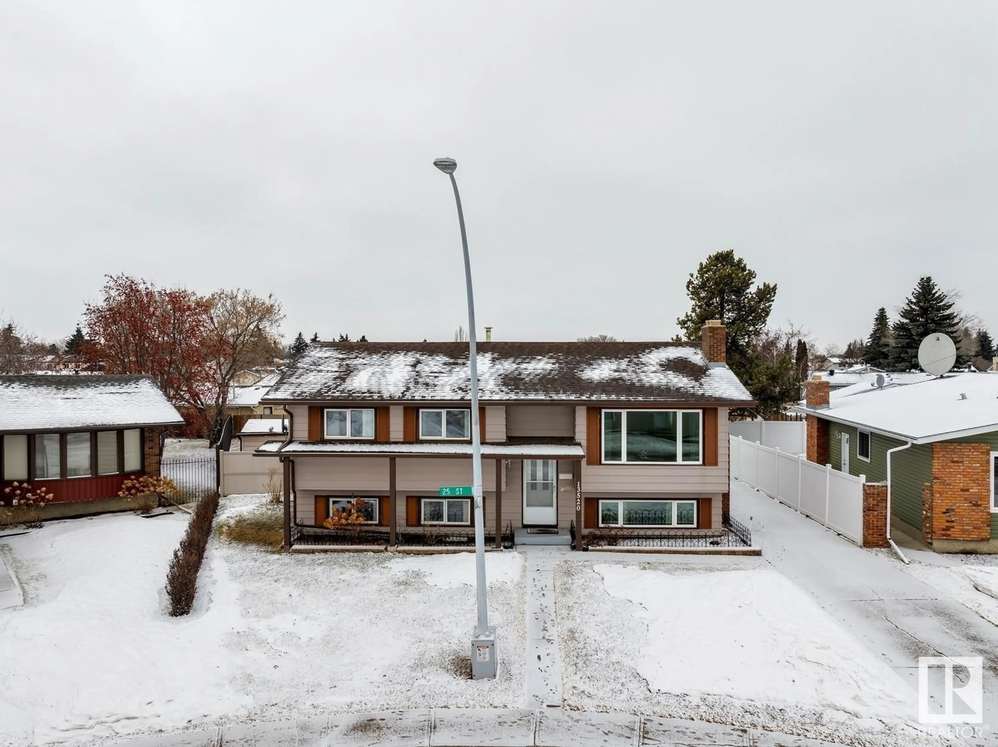 A pic from outside/outdoor area/front of a property/back of a property/a pic from drone, street for 13520 25 ST NW, Edmonton Alberta T5A3V6