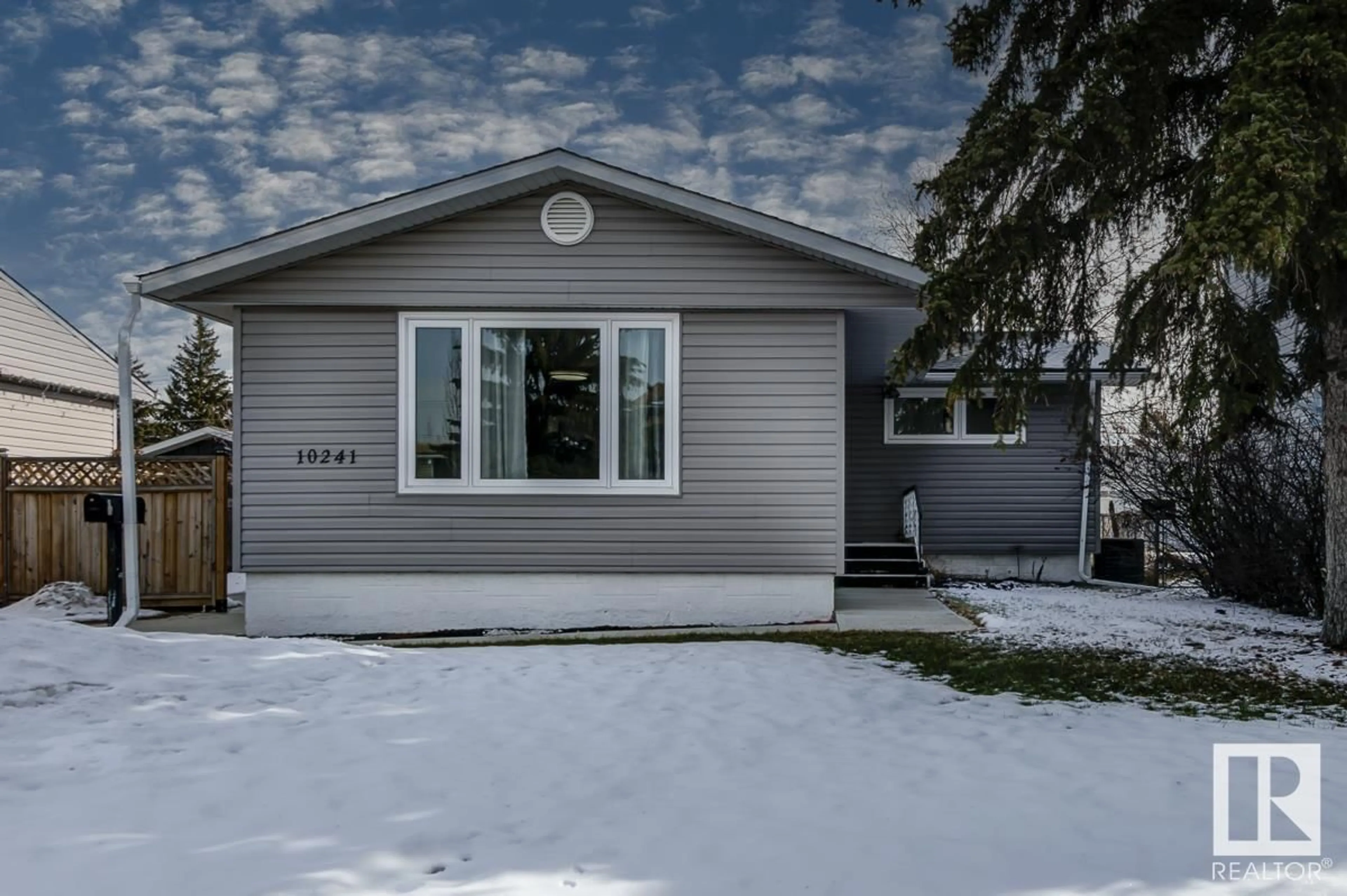 Home with vinyl exterior material, street for 10241 162 ST N NW, Edmonton Alberta T5P3L8