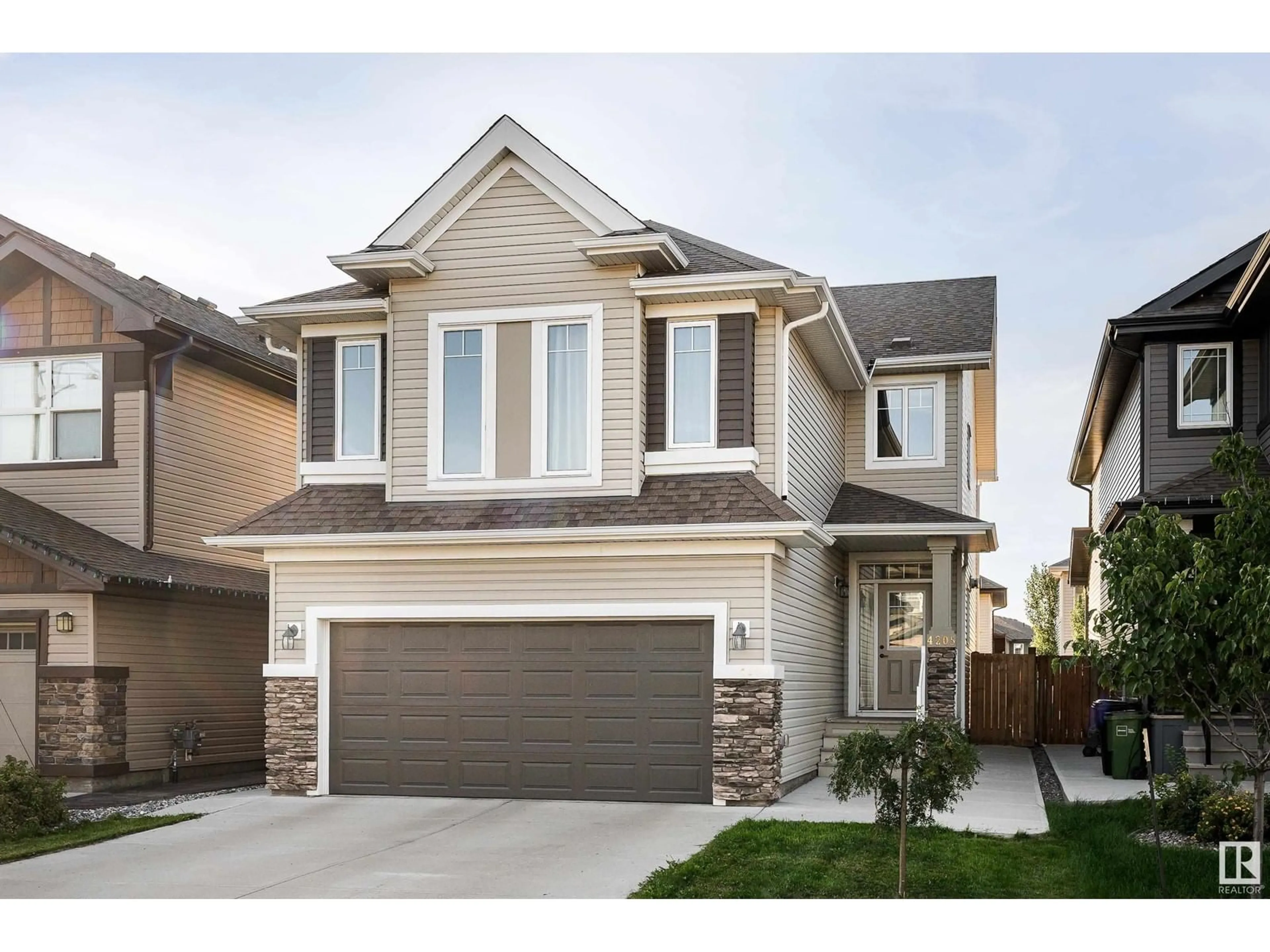 Home with vinyl exterior material, street for 4205 171A AV, Edmonton Alberta T5Y0Z4