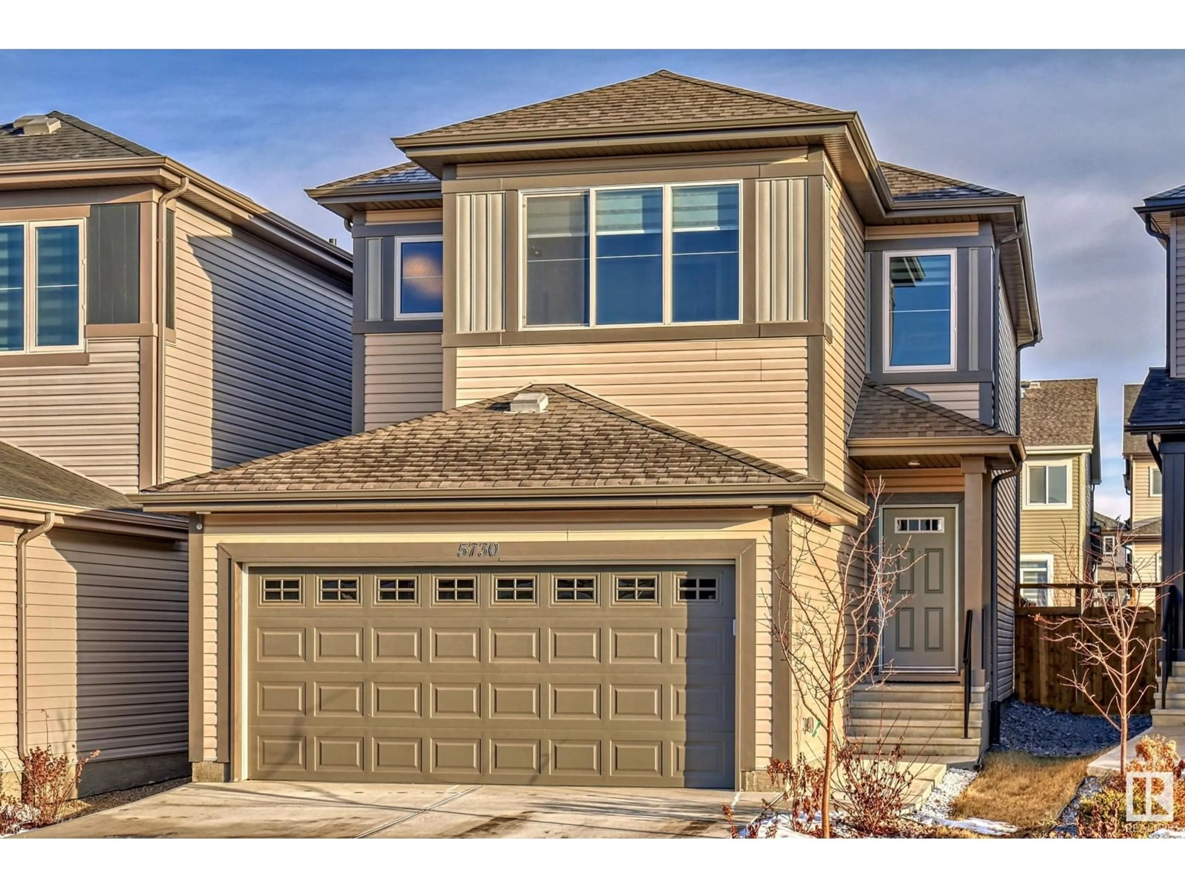 Home with vinyl exterior material, street for 5730 CAUTLEY CR SW, Edmonton Alberta T6W4X9