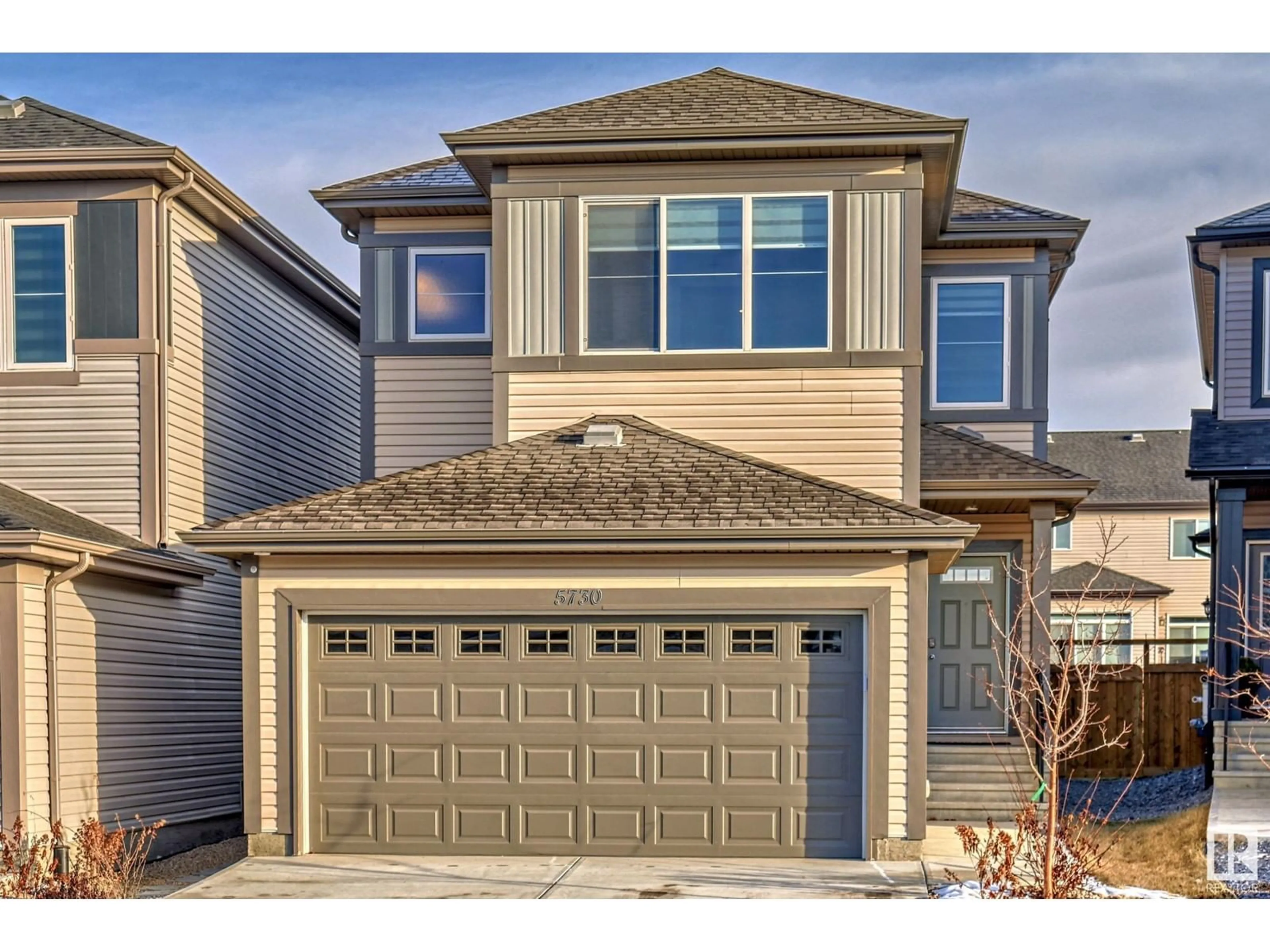 Home with vinyl exterior material, street for 5730 CAUTLEY CR SW, Edmonton Alberta T6W4X9