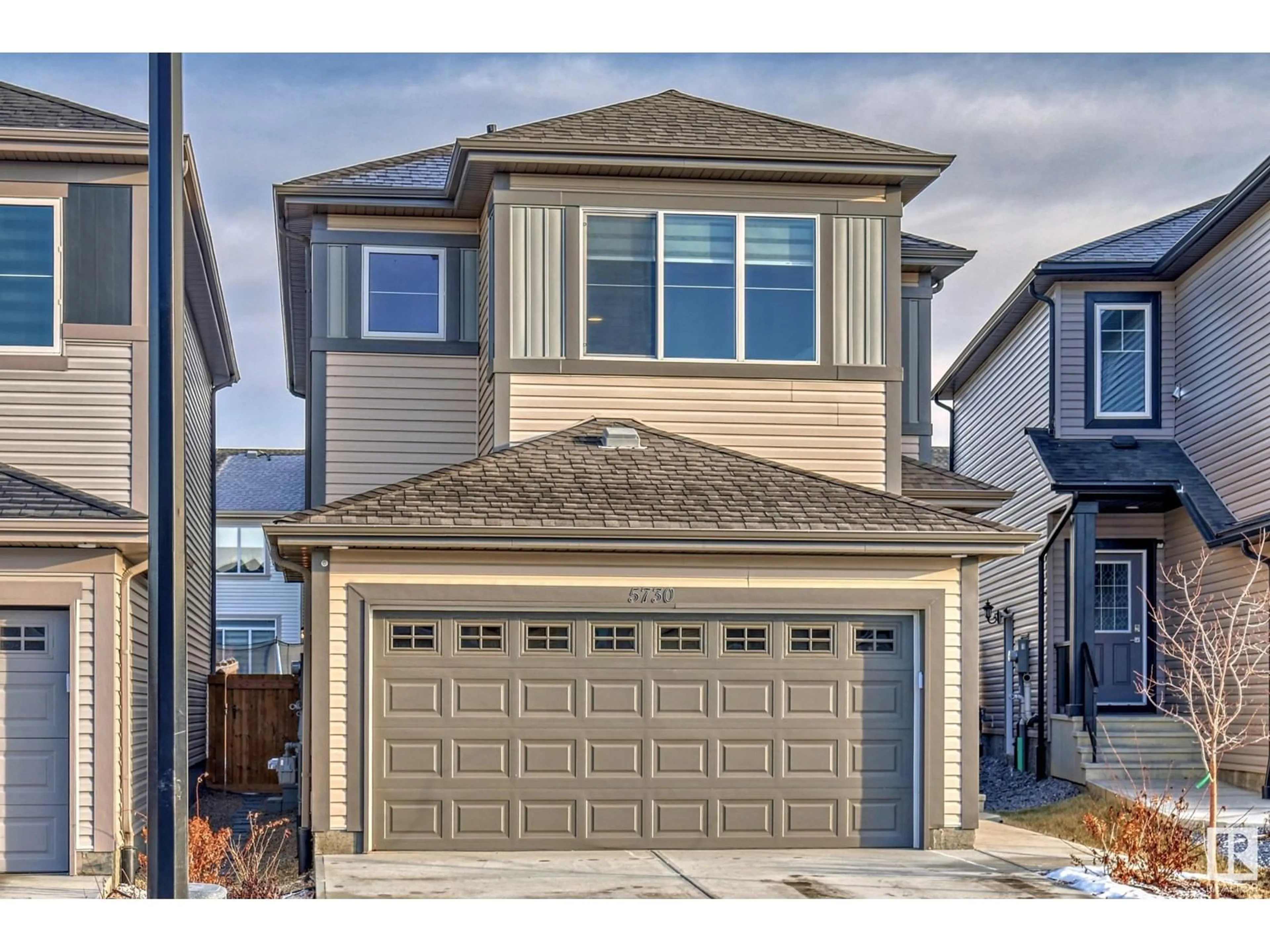 Home with vinyl exterior material, street for 5730 CAUTLEY CR SW, Edmonton Alberta T6W4X9