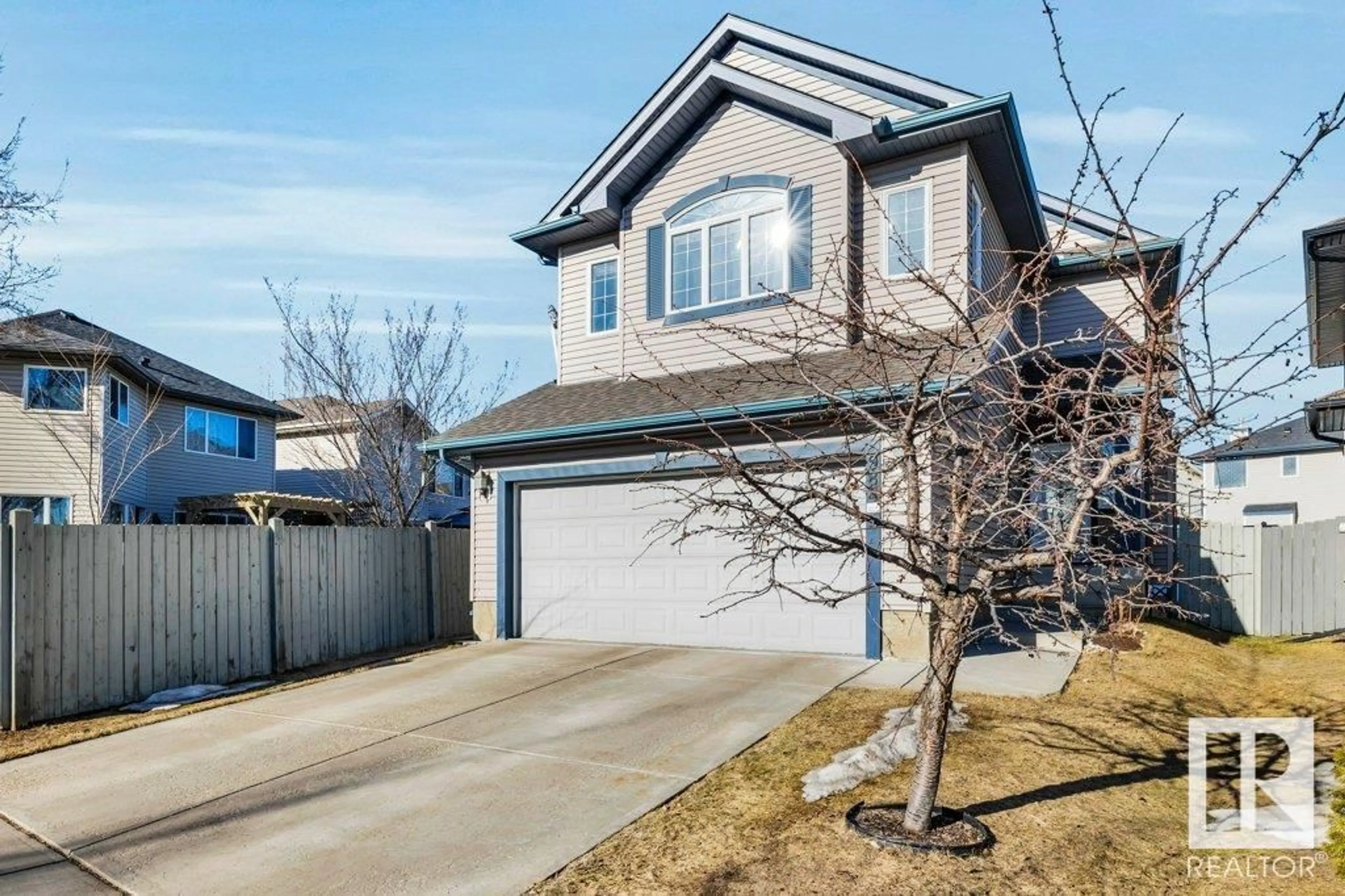 Home with vinyl exterior material, street for 984 RUTHERFORD RD, Edmonton Alberta T6W1W9