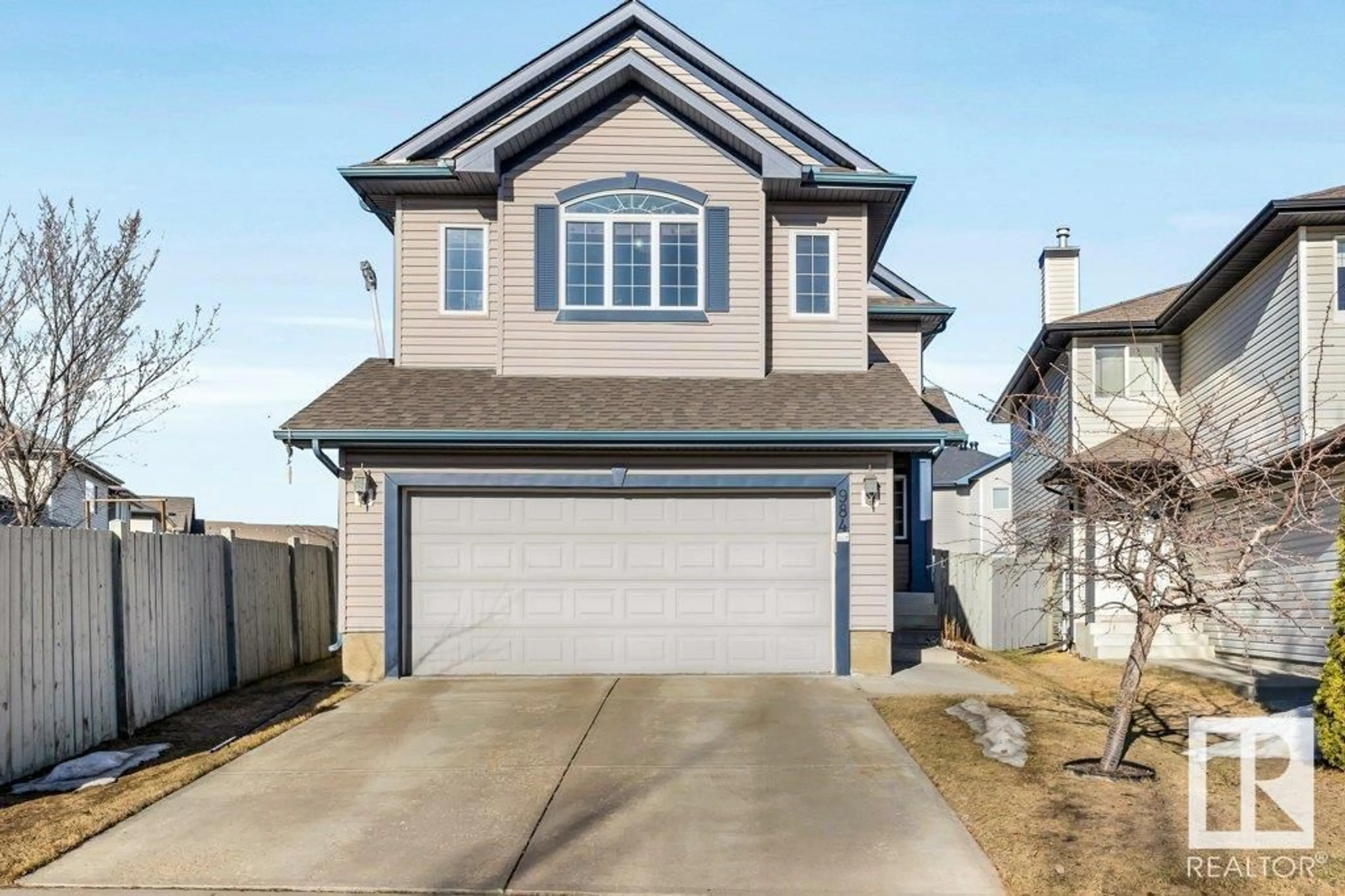 Home with vinyl exterior material, street for 984 RUTHERFORD RD SW, Edmonton Alberta T6W1W9