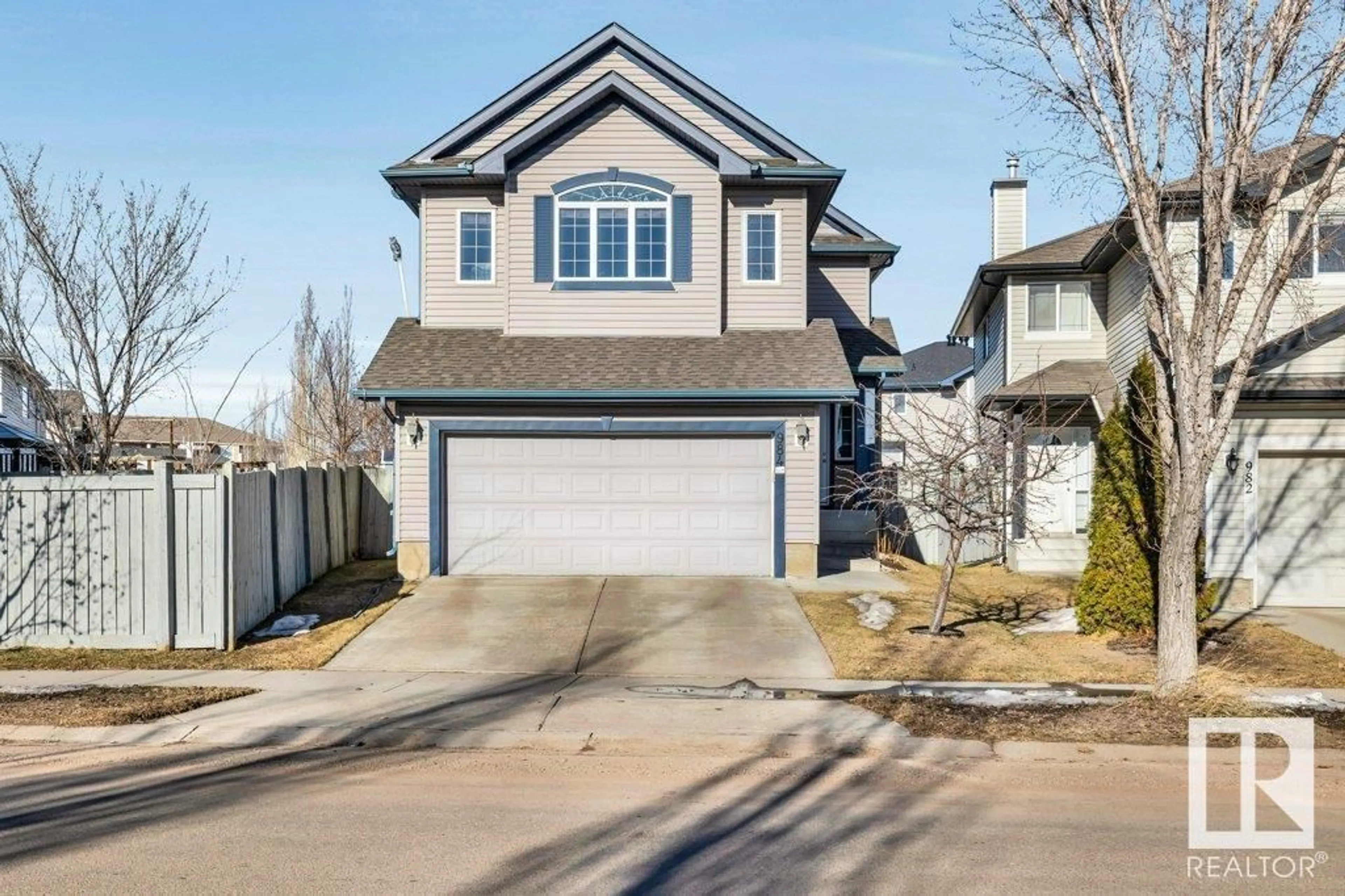 Home with vinyl exterior material, street for 984 RUTHERFORD RD SW, Edmonton Alberta T6W1W9