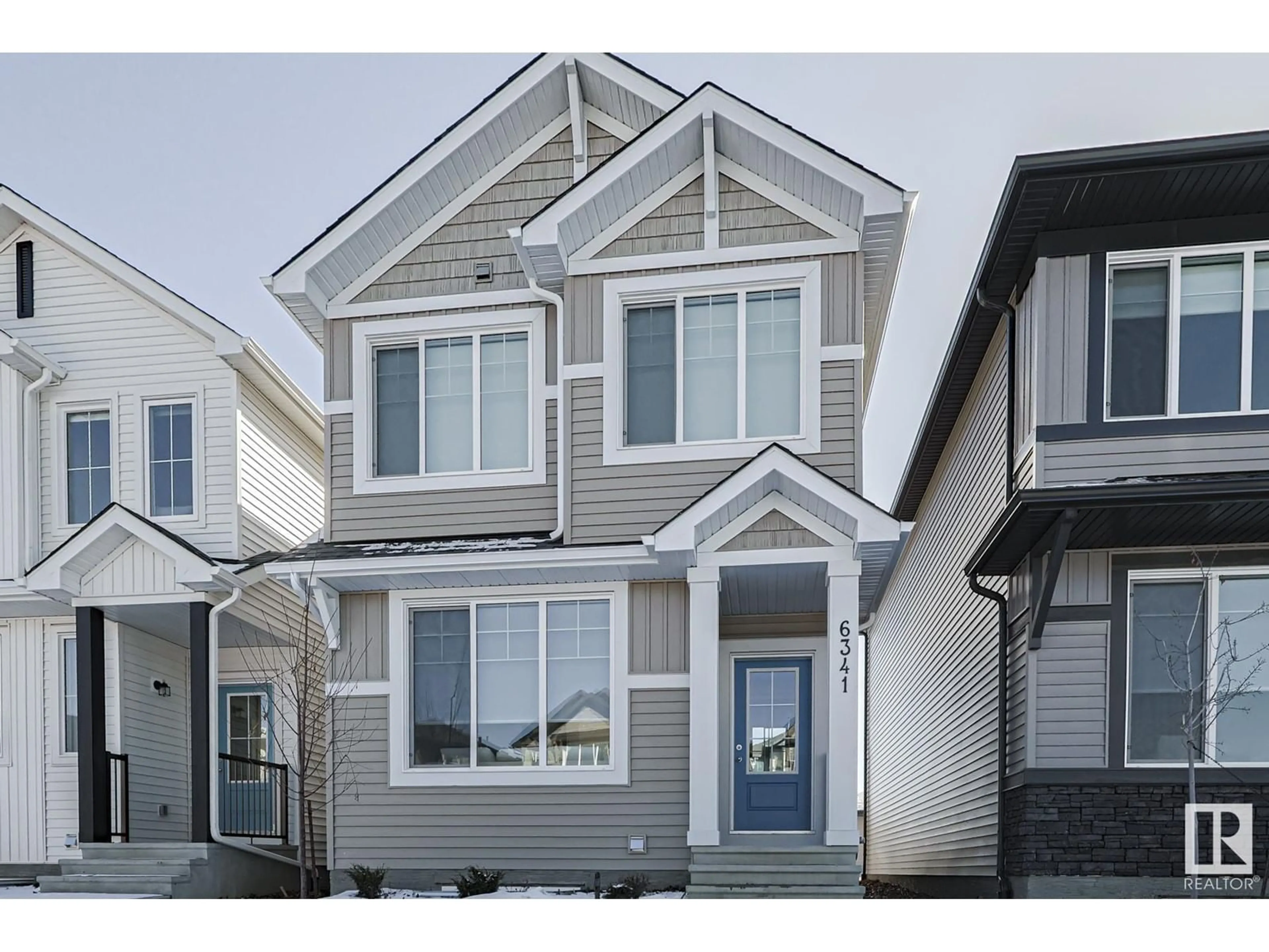 Home with vinyl exterior material, street for 6341 KING WD SW, Edmonton Alberta T6W5P1