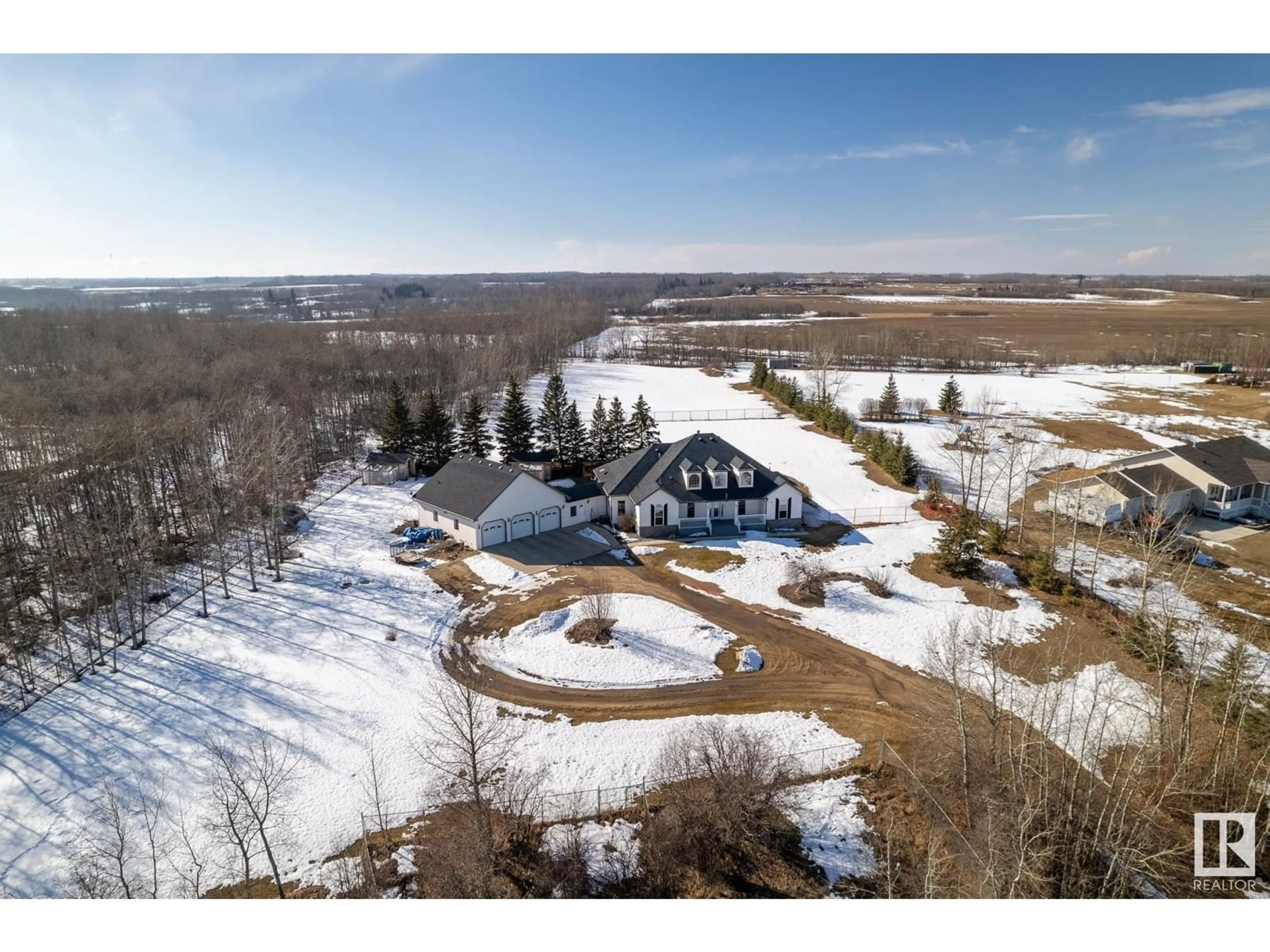 A pic from outside/outdoor area/front of a property/back of a property/a pic from drone, mountain view for #71 Hillsborough Heights, Rural Sturgeon County Alberta T0A1N5