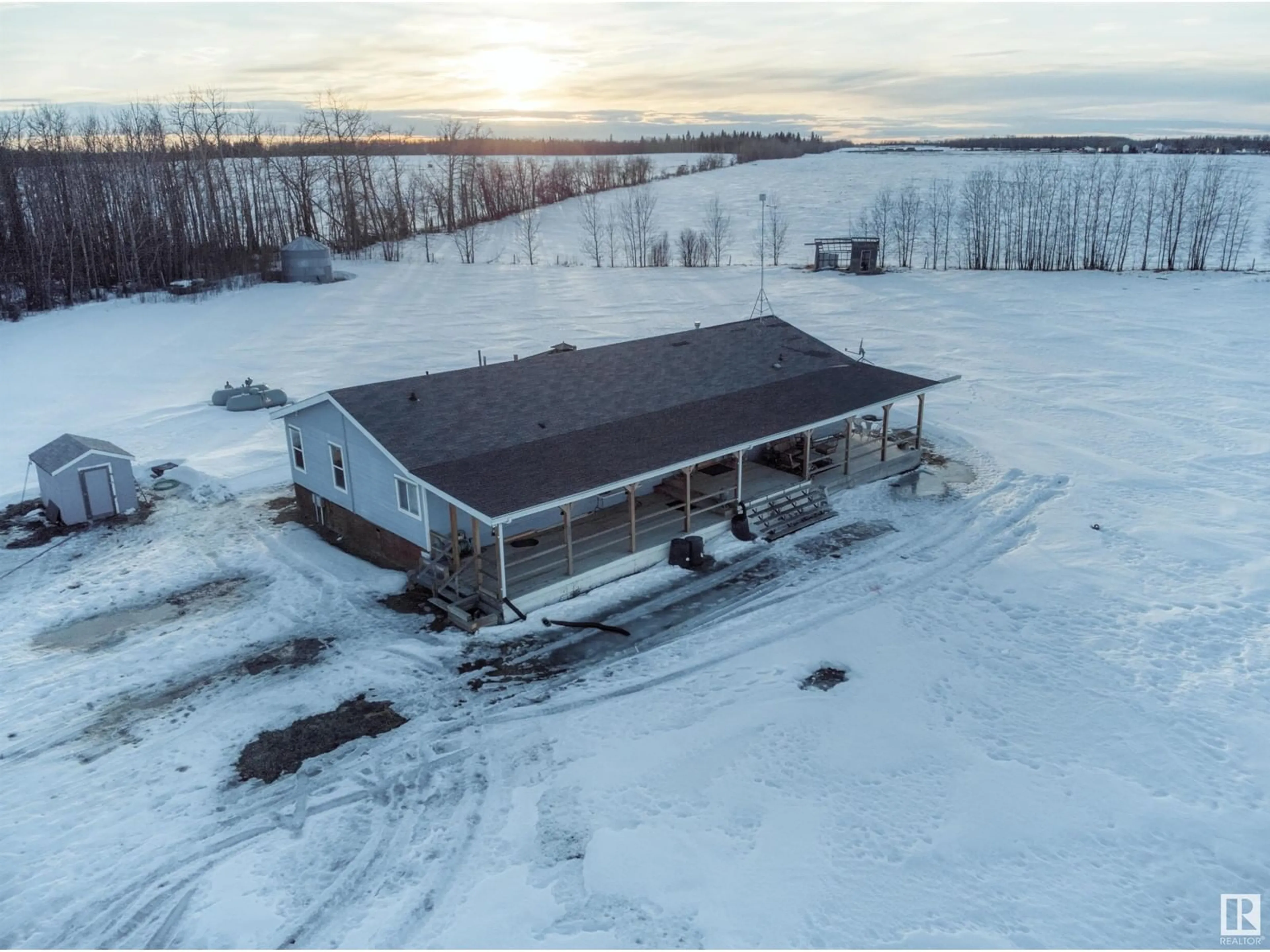 A pic from outside/outdoor area/front of a property/back of a property/a pic from drone, building for 27011 TWP RD 580, Rural Westlock County Alberta T0G0A6
