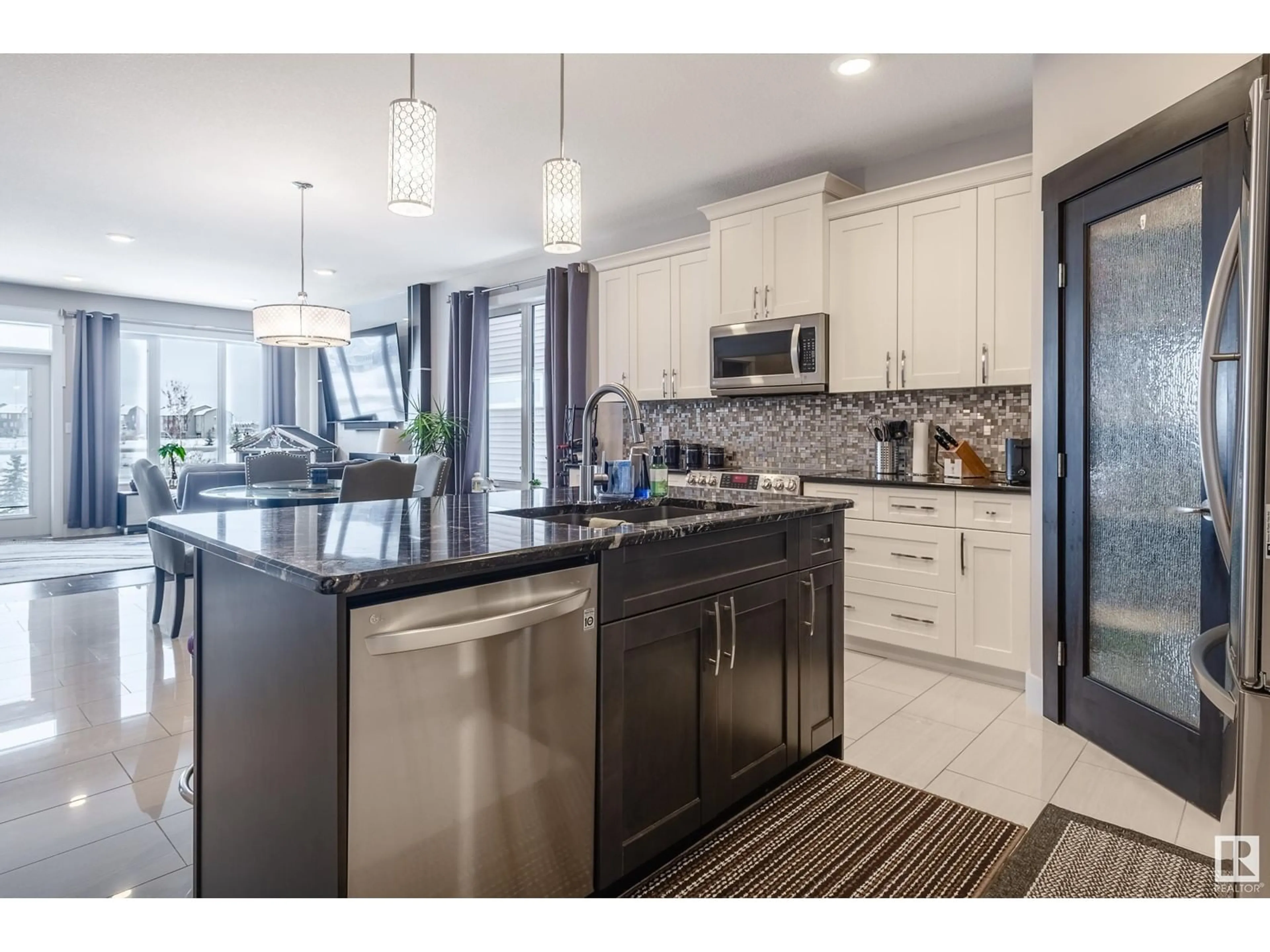 Open concept kitchen, ceramic/tile floor for 21832 80 AV NW, Edmonton Alberta T5T4S2