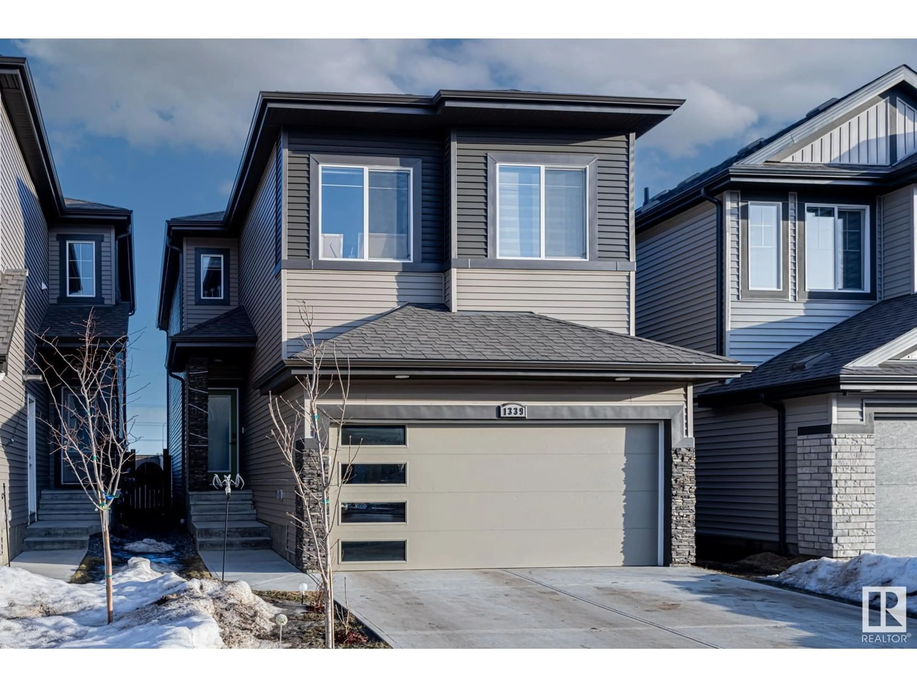 Home with vinyl exterior material, street for 1339 20 ST NW, Edmonton Alberta T6T2R7