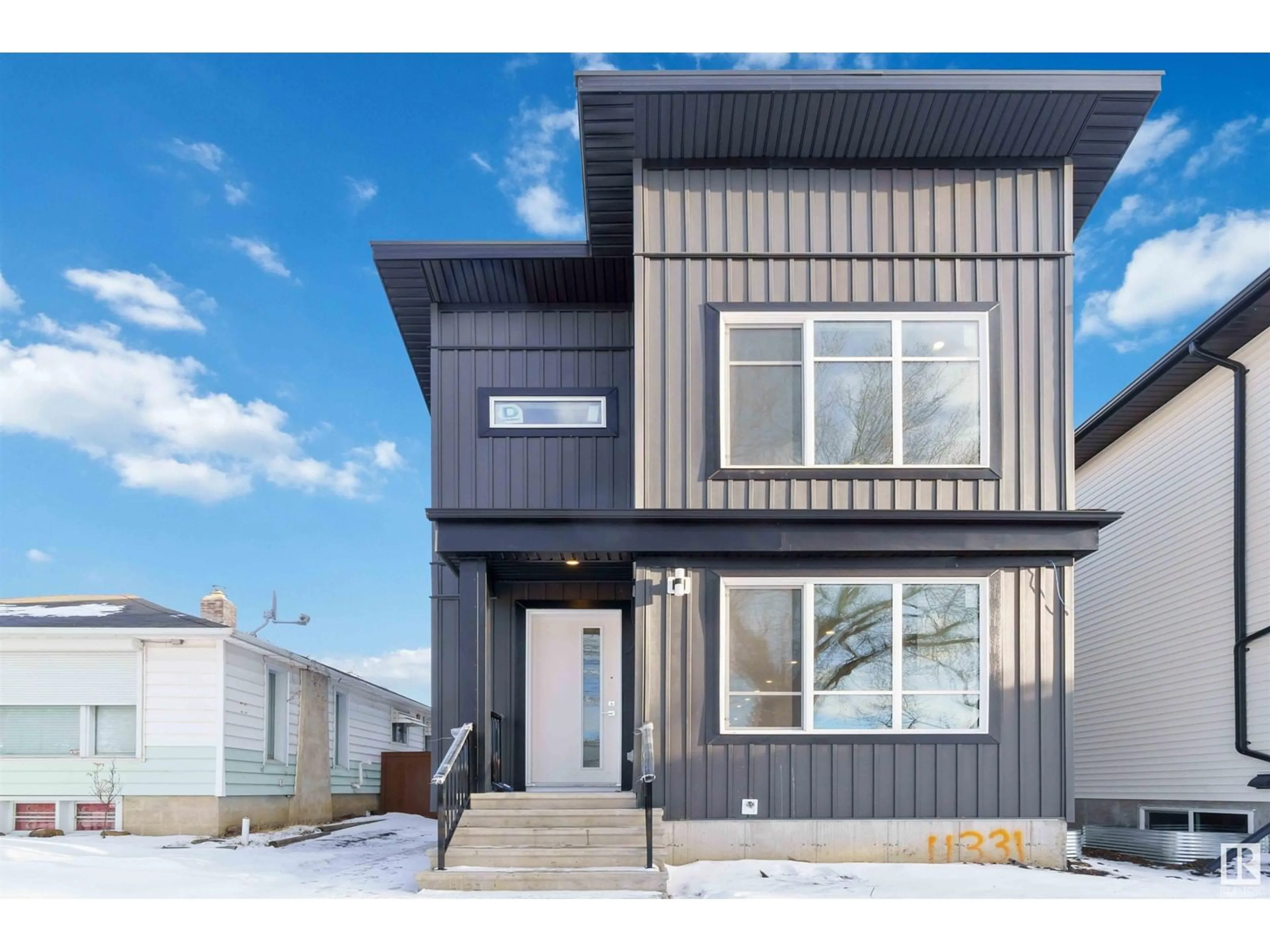 Home with vinyl exterior material, street for NW - 11331 103 ST, Edmonton Alberta T5G2H8