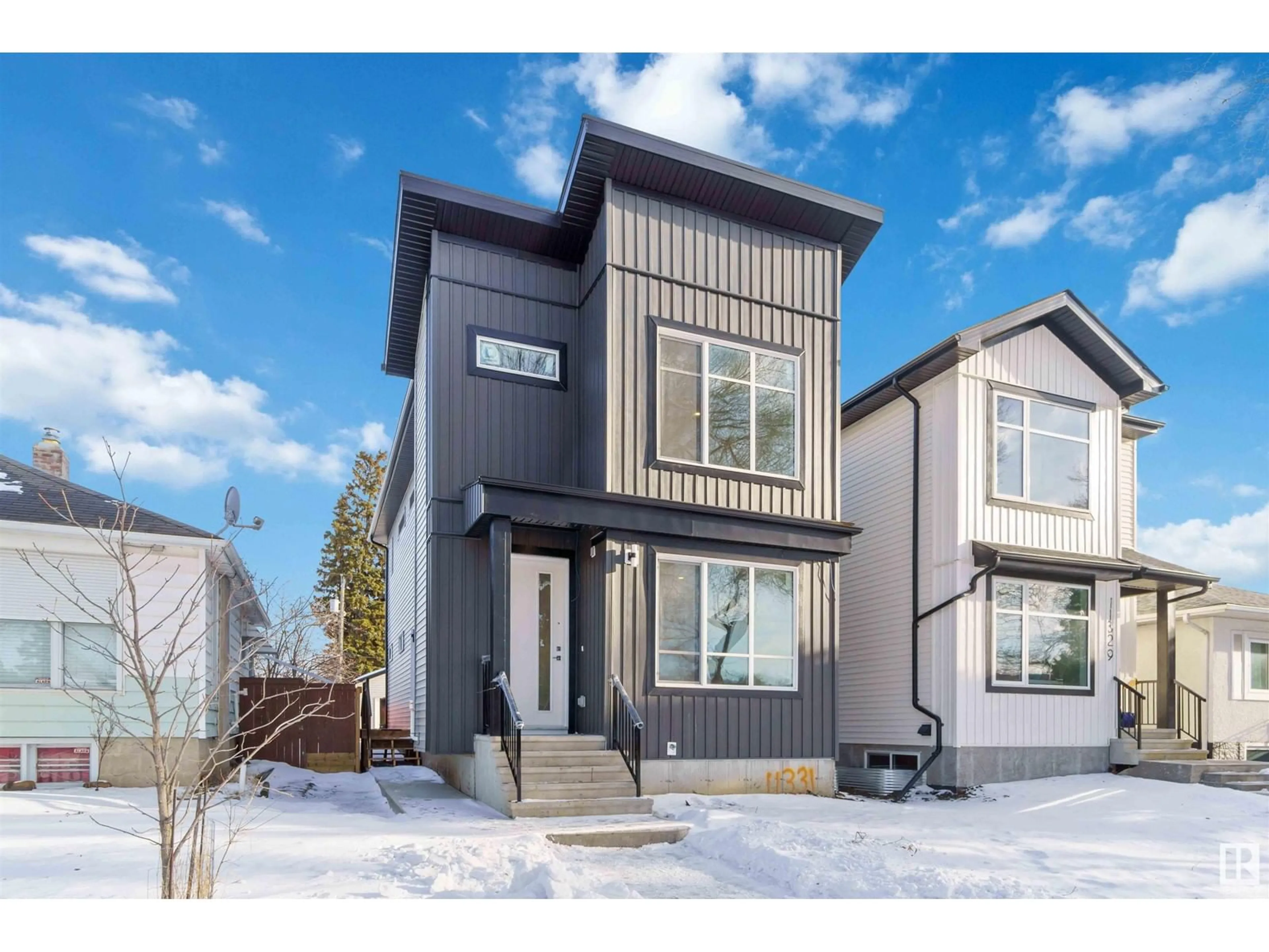 Home with vinyl exterior material, street for NW - 11331 103 ST, Edmonton Alberta T5G2H8
