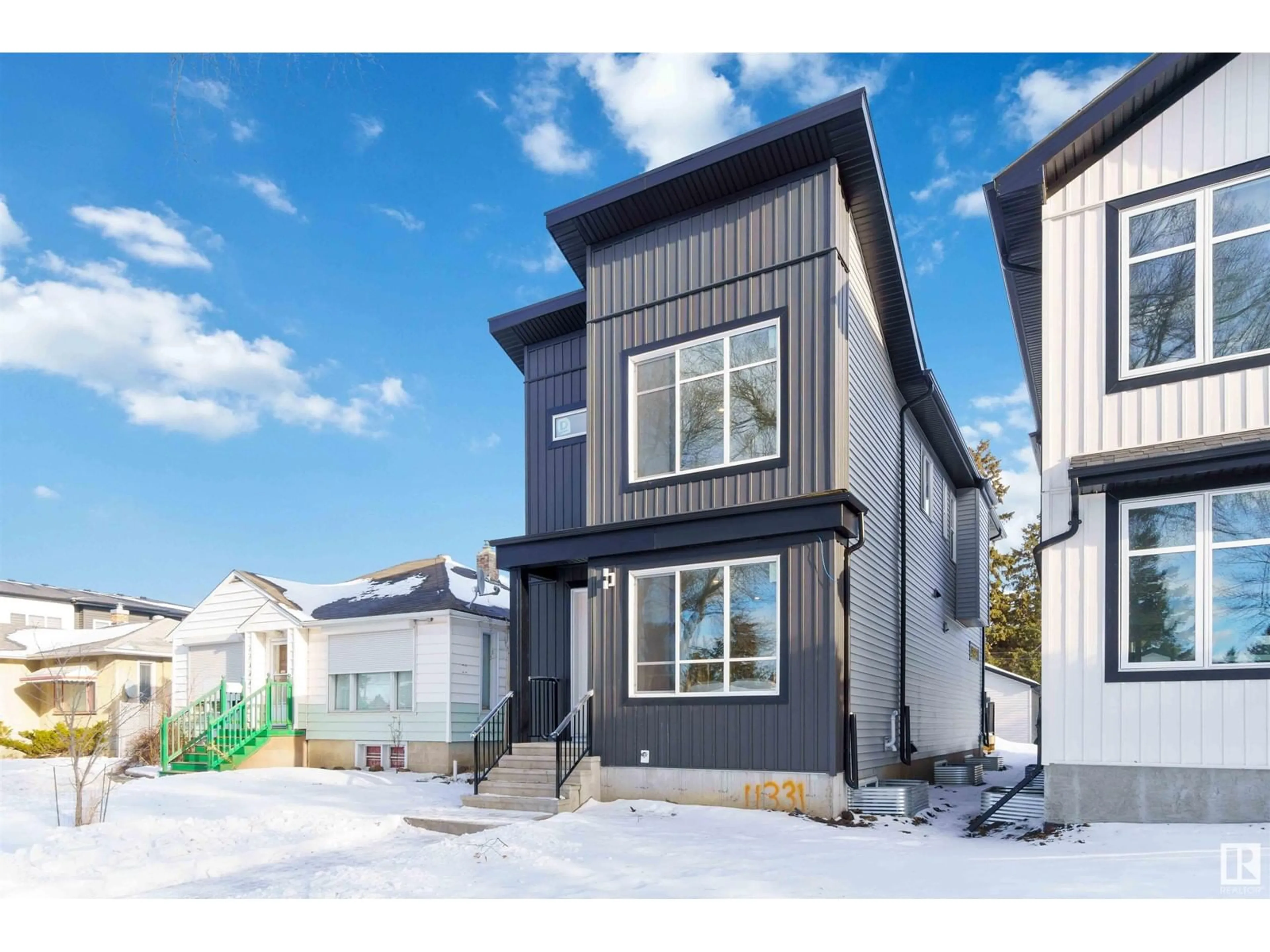 Home with vinyl exterior material, street for NW - 11331 103 ST, Edmonton Alberta T5G2H8