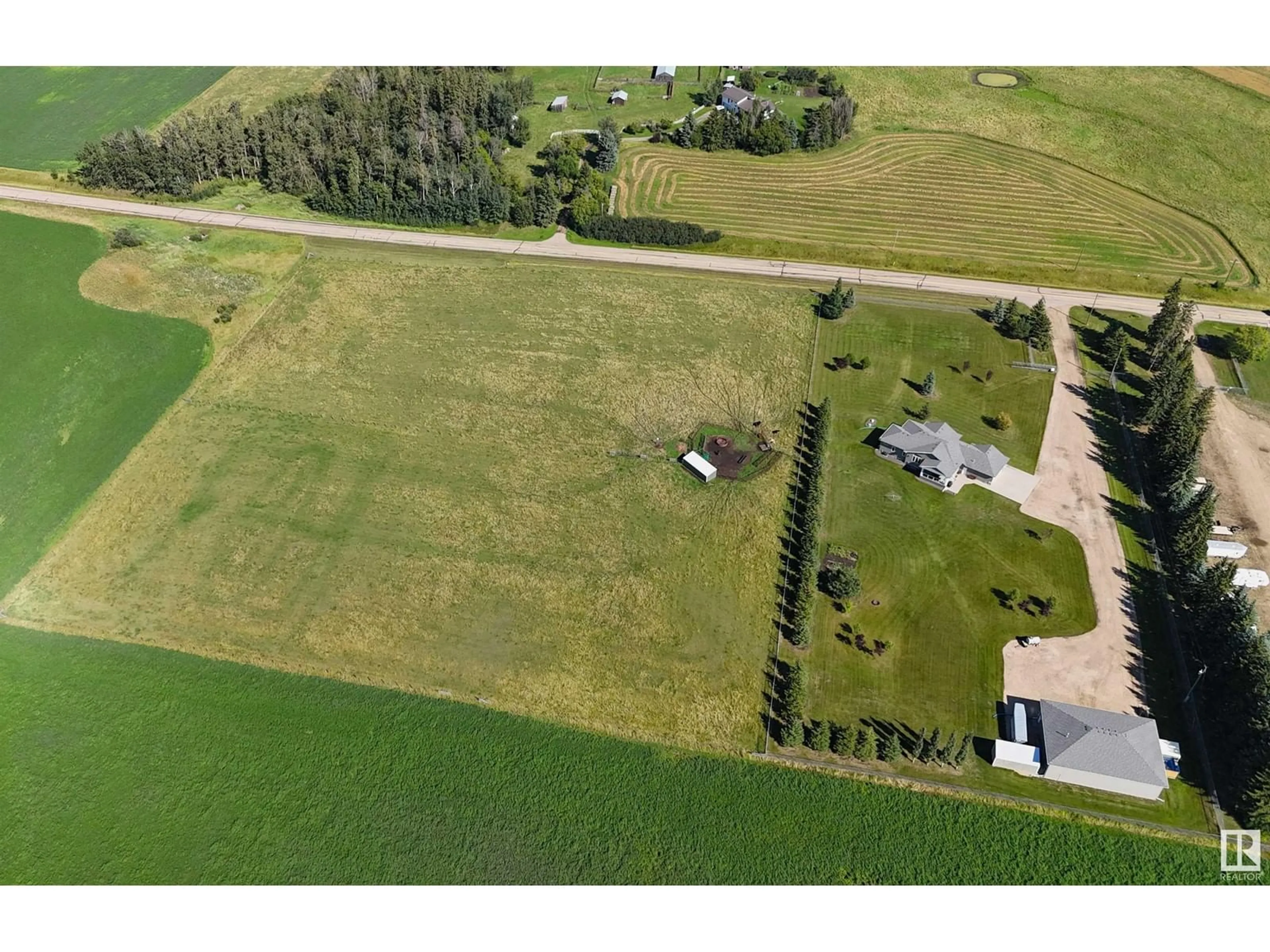 A pic from outside/outdoor area/front of a property/back of a property/a pic from drone, unknown for 51206A RGE ROAD 12, Rural Parkland County Alberta T7Y2B5