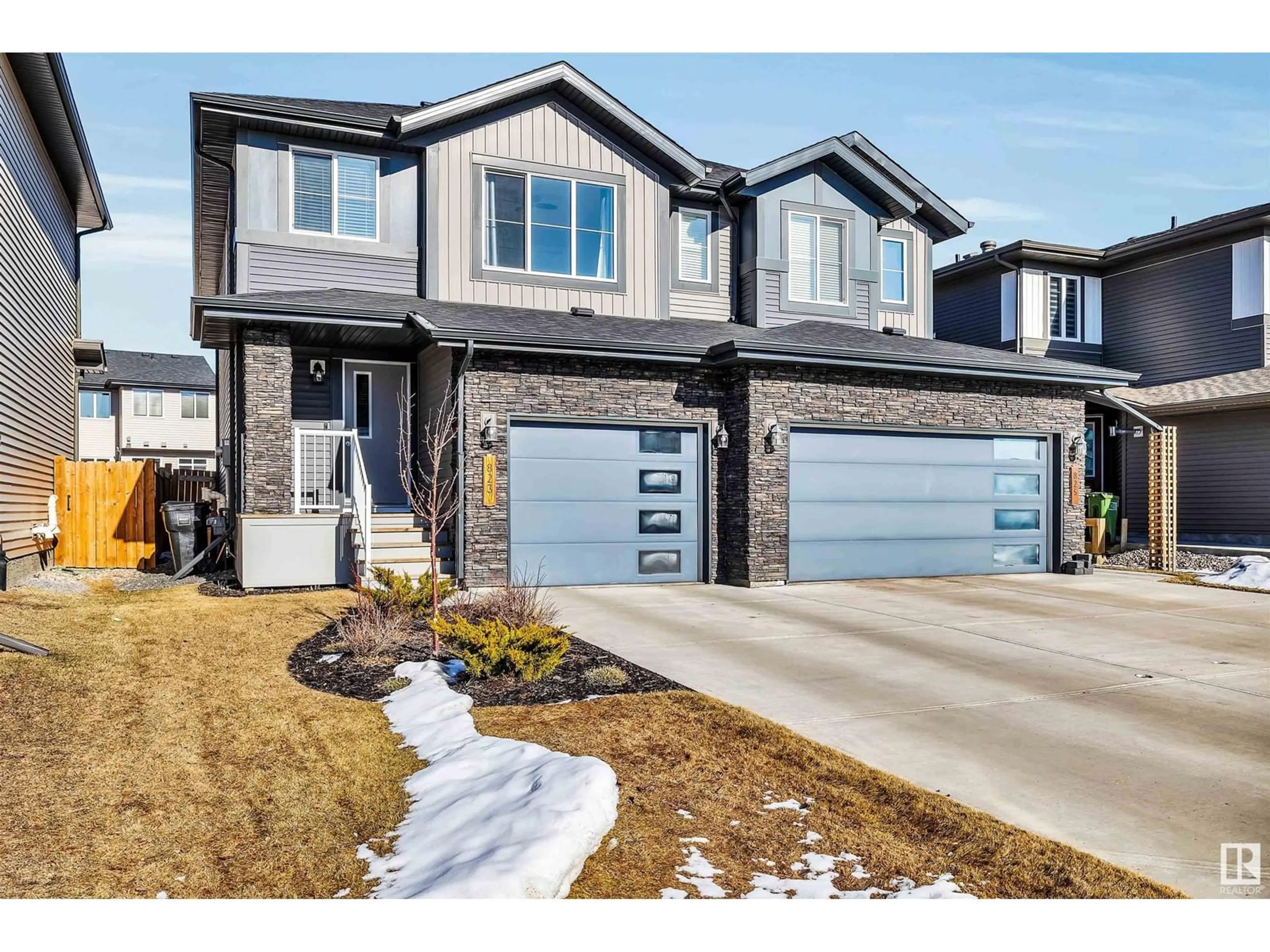 Home with brick exterior material, street for 823 CAVANAGH HEATH HE SW, Edmonton Alberta T6W3Y1