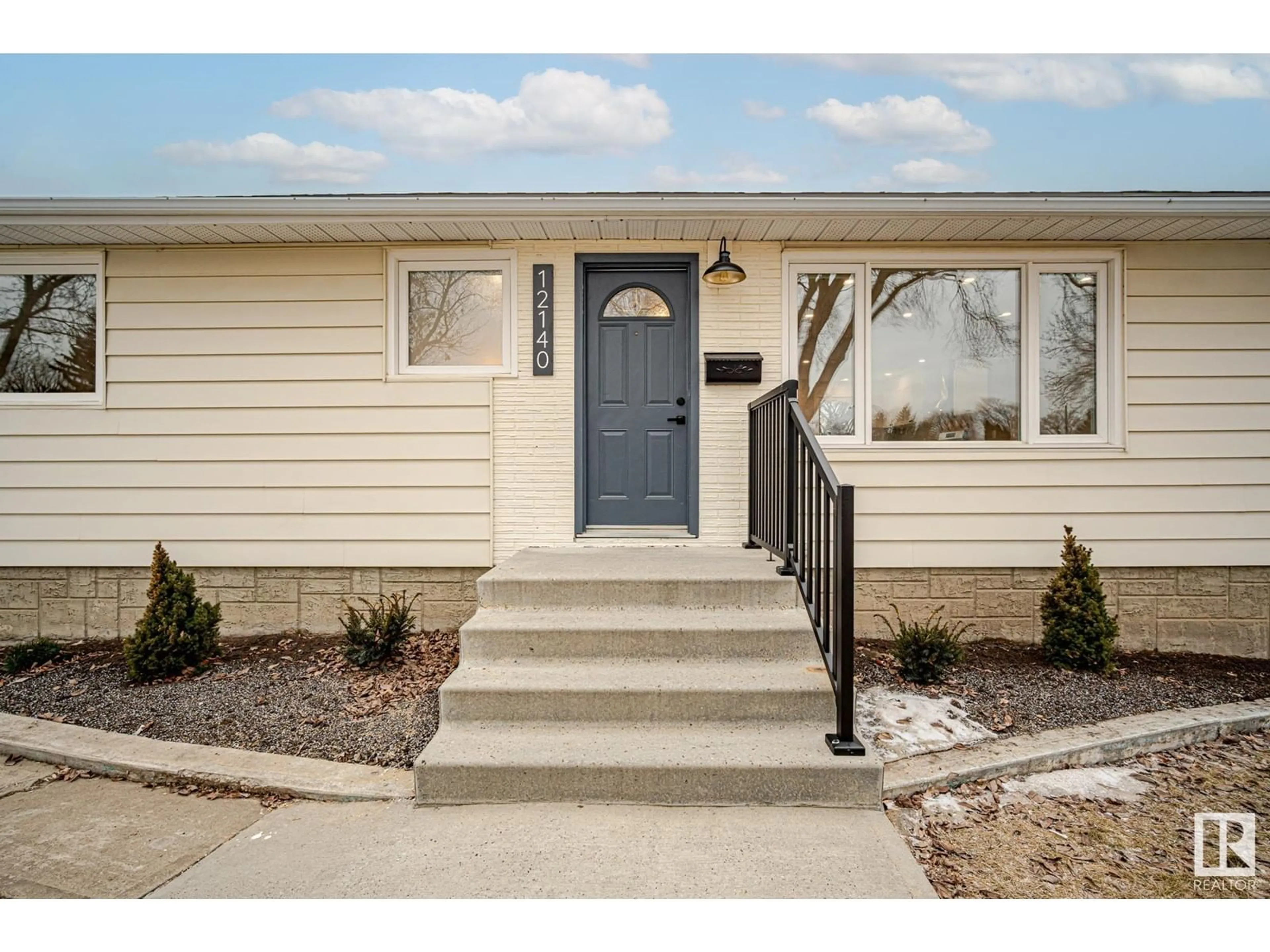 Home with vinyl exterior material, street for 12140 39 ST NW, Edmonton Alberta T5W2K1